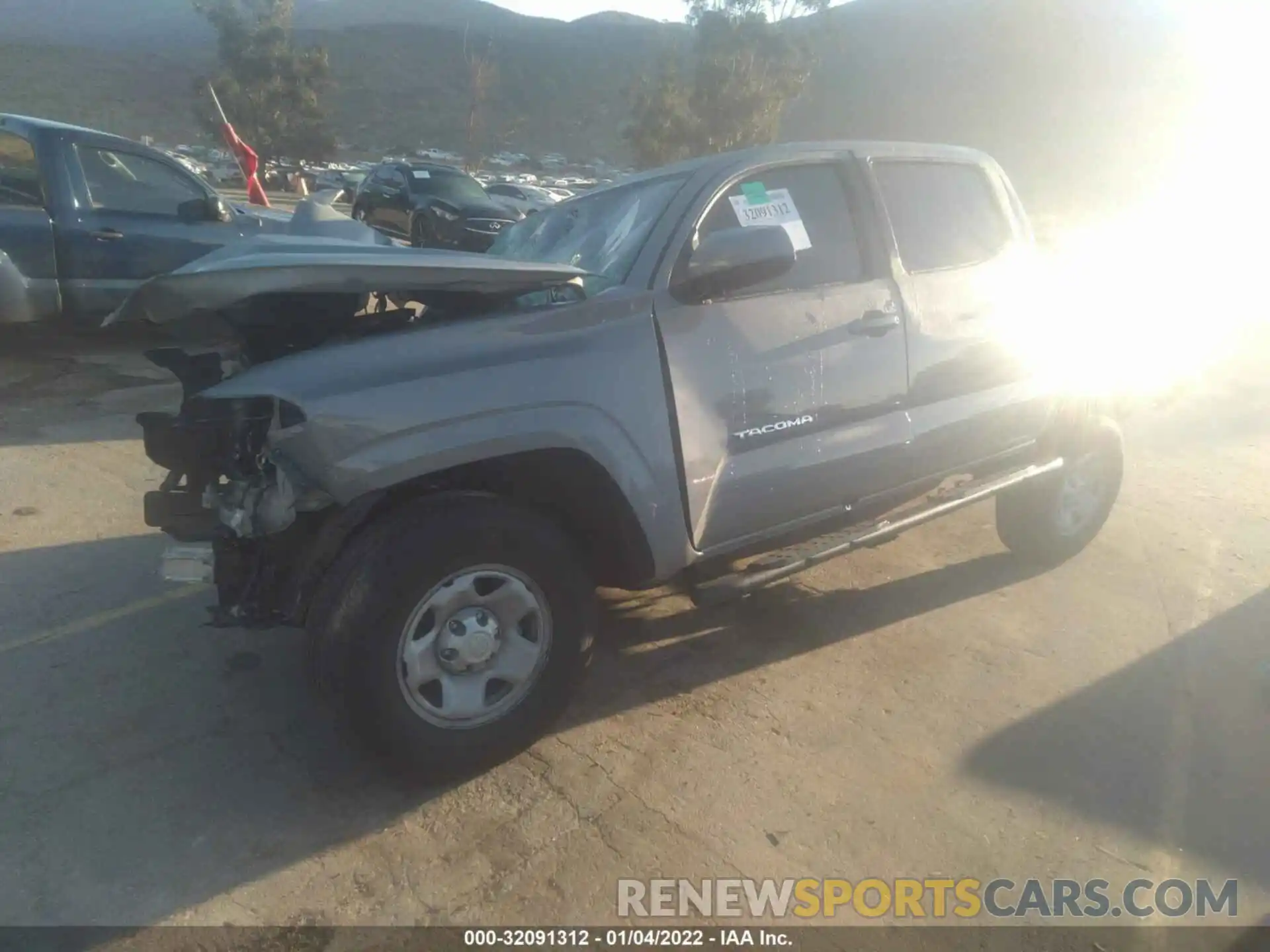 2 Photograph of a damaged car 5TFAX5GN7KX153970 TOYOTA TACOMA 2WD 2019