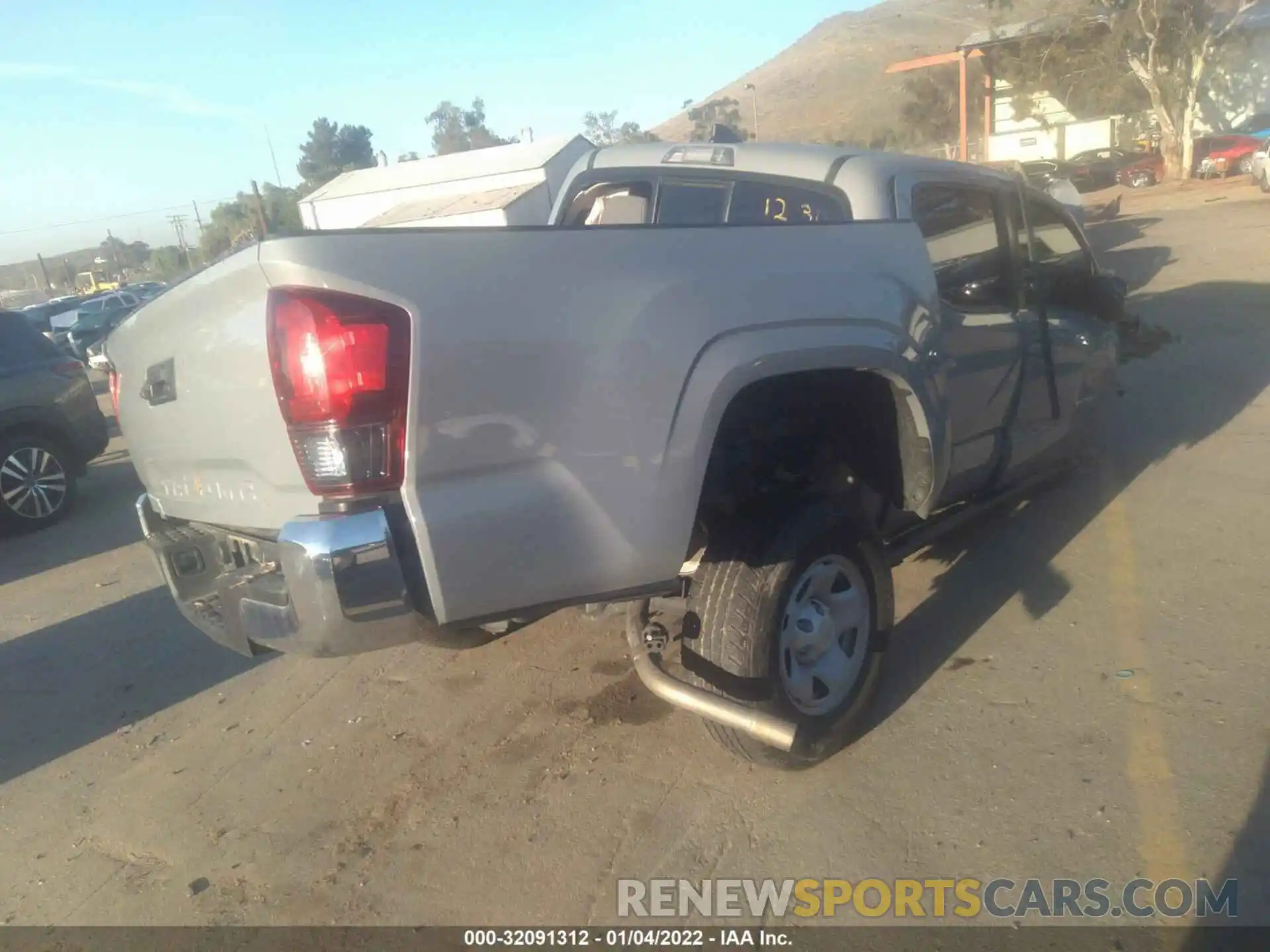 4 Photograph of a damaged car 5TFAX5GN7KX153970 TOYOTA TACOMA 2WD 2019