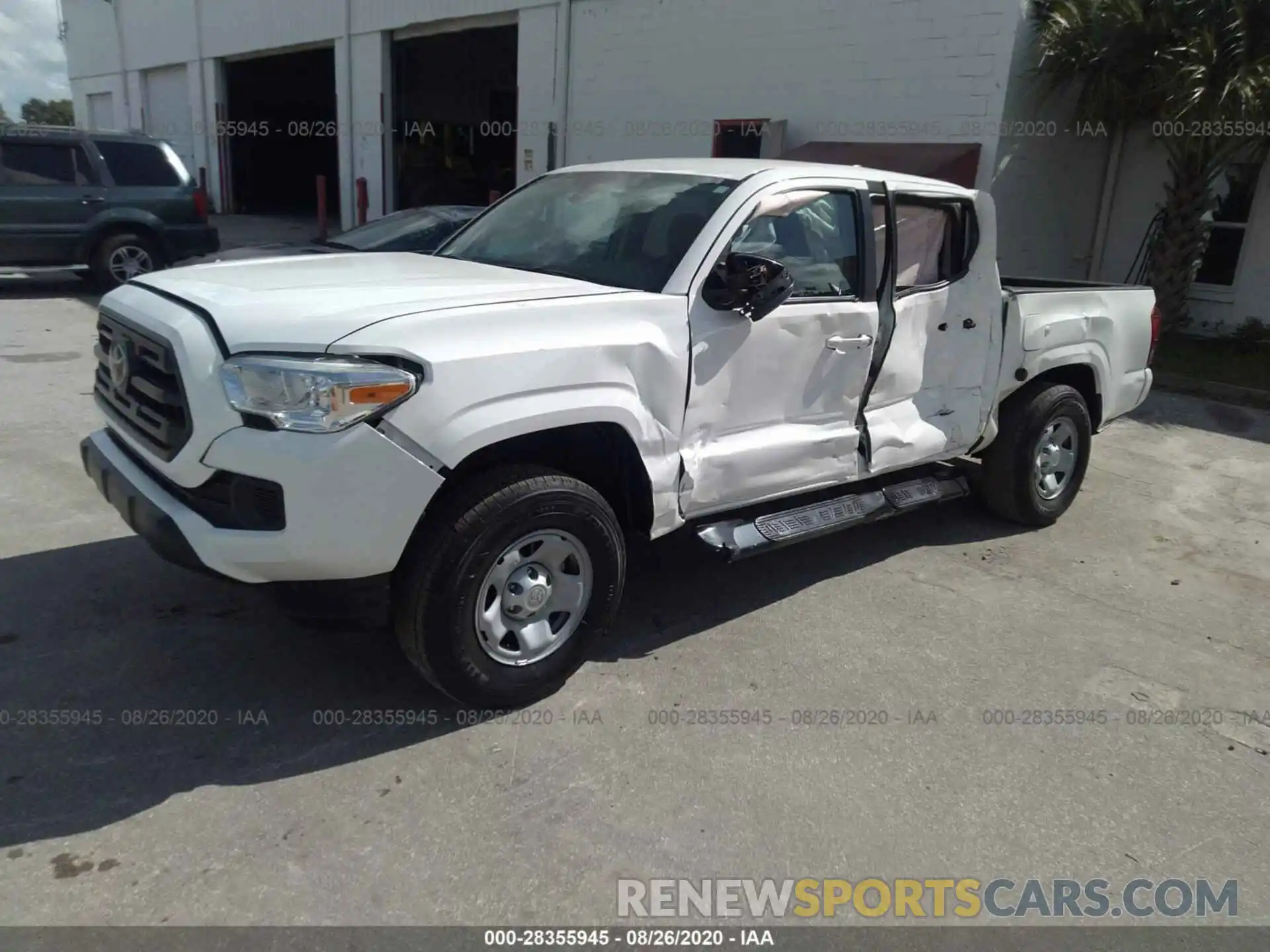 2 Photograph of a damaged car 5TFAX5GN7KX154956 TOYOTA TACOMA 2WD 2019