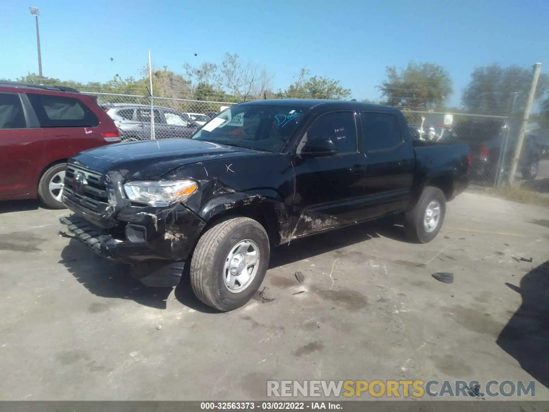 2 Photograph of a damaged car 5TFAX5GN7KX159333 TOYOTA TACOMA 2WD 2019