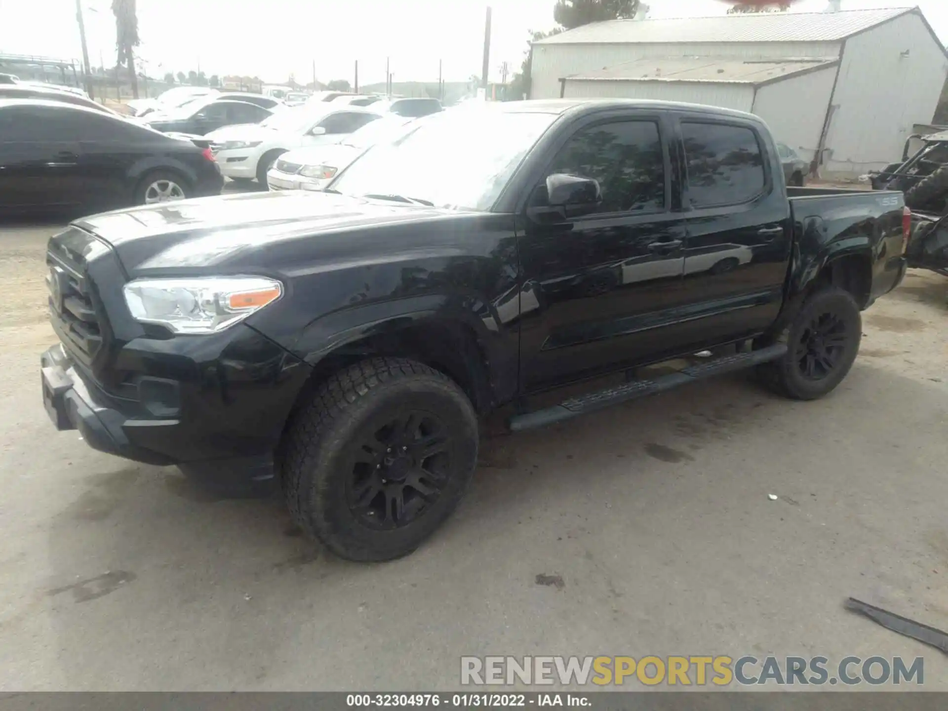 2 Photograph of a damaged car 5TFAX5GN8KX136031 TOYOTA TACOMA 2WD 2019