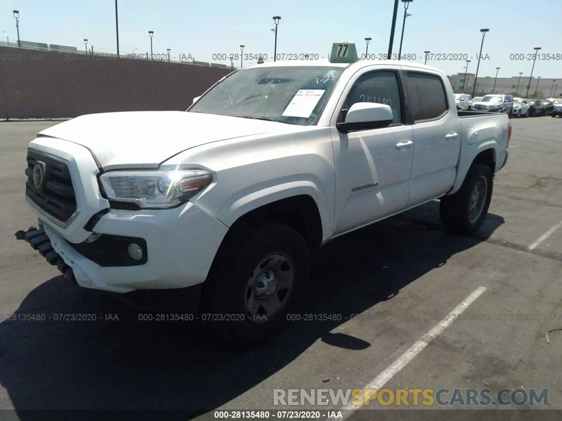 2 Photograph of a damaged car 5TFAX5GN8KX147112 TOYOTA TACOMA 2WD 2019