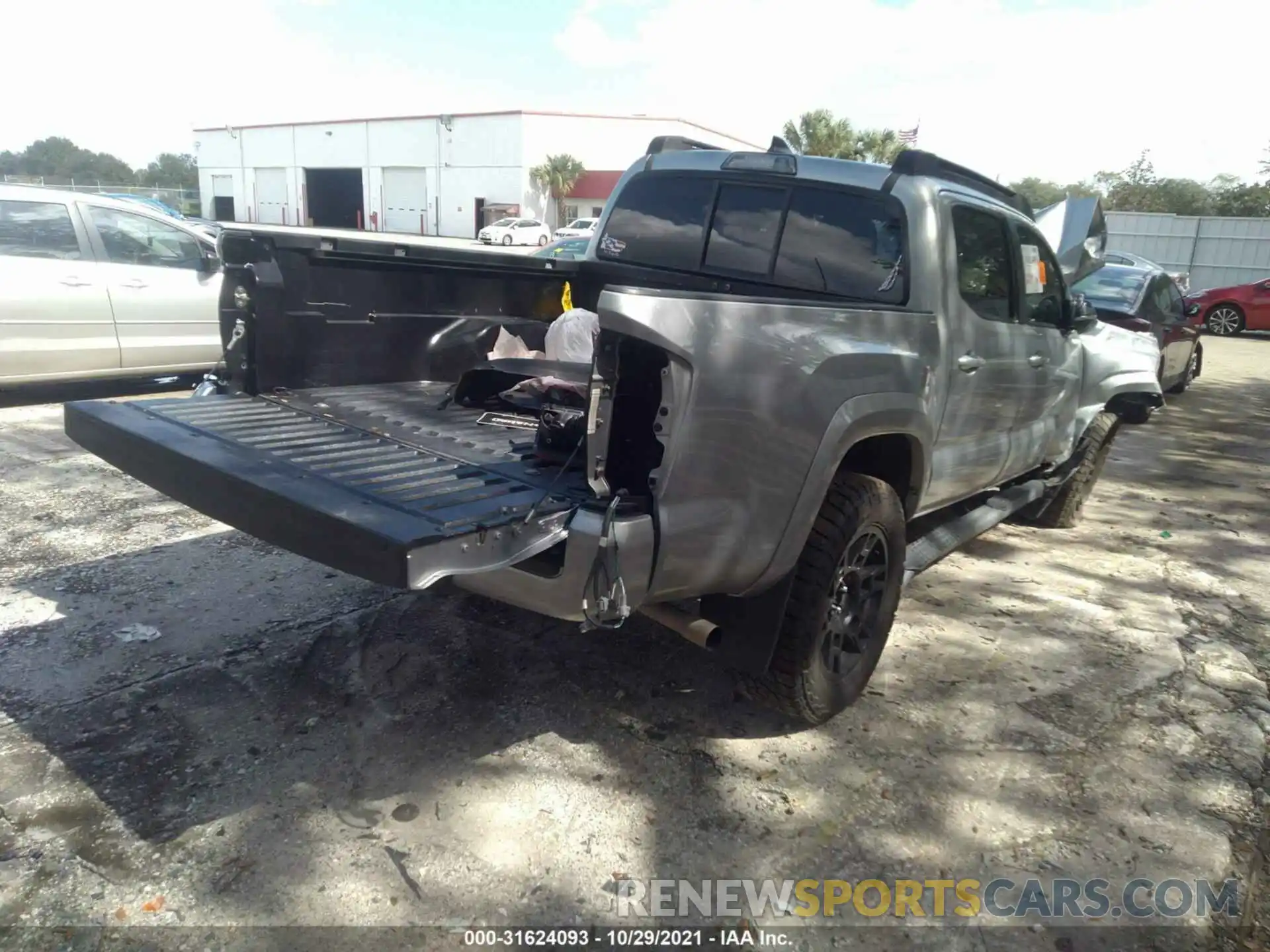 4 Photograph of a damaged car 5TFAX5GN8KX156375 TOYOTA TACOMA 2WD 2019