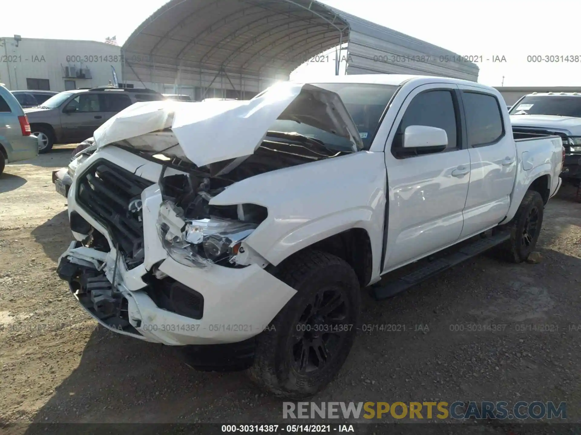 2 Photograph of a damaged car 5TFAX5GN8KX161978 TOYOTA TACOMA 2WD 2019