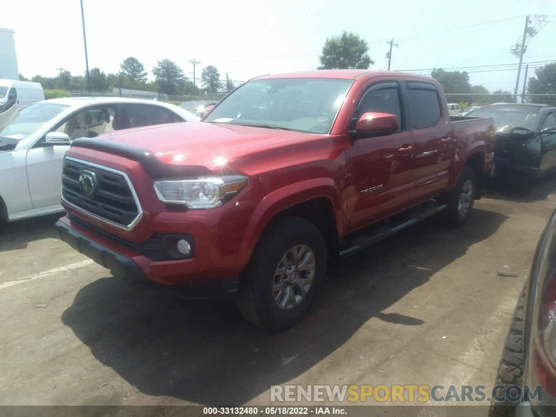 2 Photograph of a damaged car 5TFAX5GN9KX135373 TOYOTA TACOMA 2WD 2019