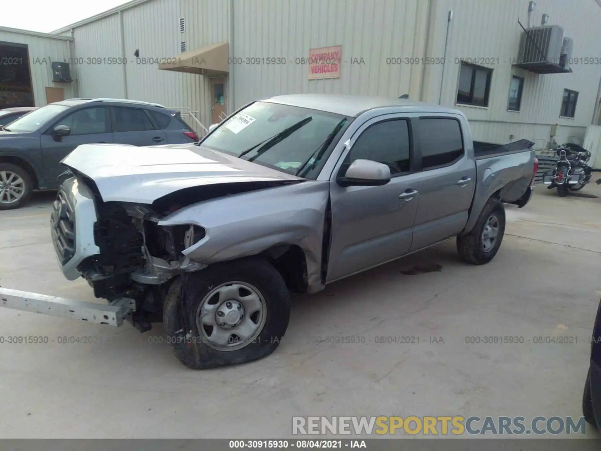 2 Photograph of a damaged car 5TFAX5GN9KX135857 TOYOTA TACOMA 2WD 2019