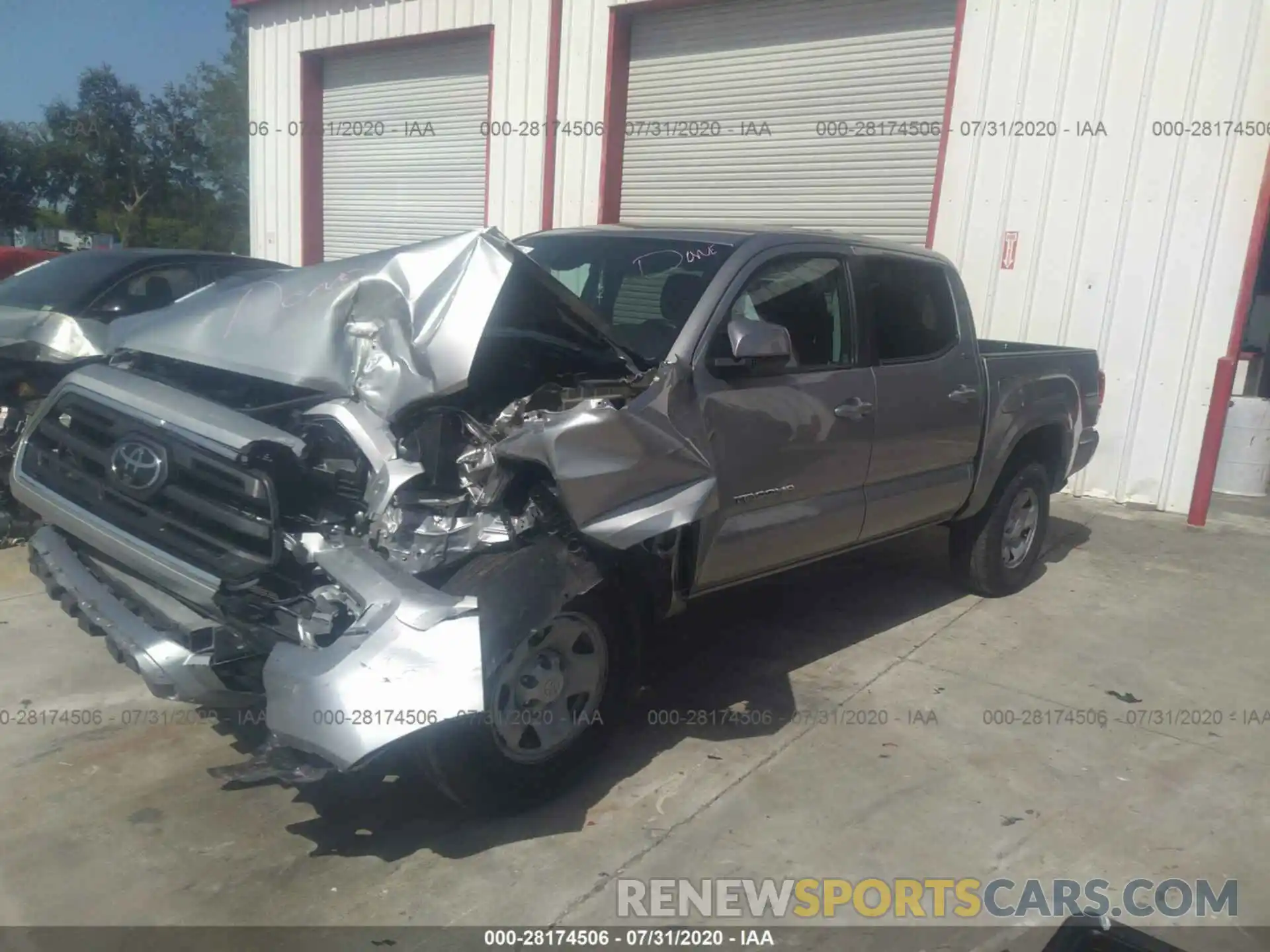 2 Photograph of a damaged car 5TFAX5GN9KX139732 TOYOTA TACOMA 2WD 2019