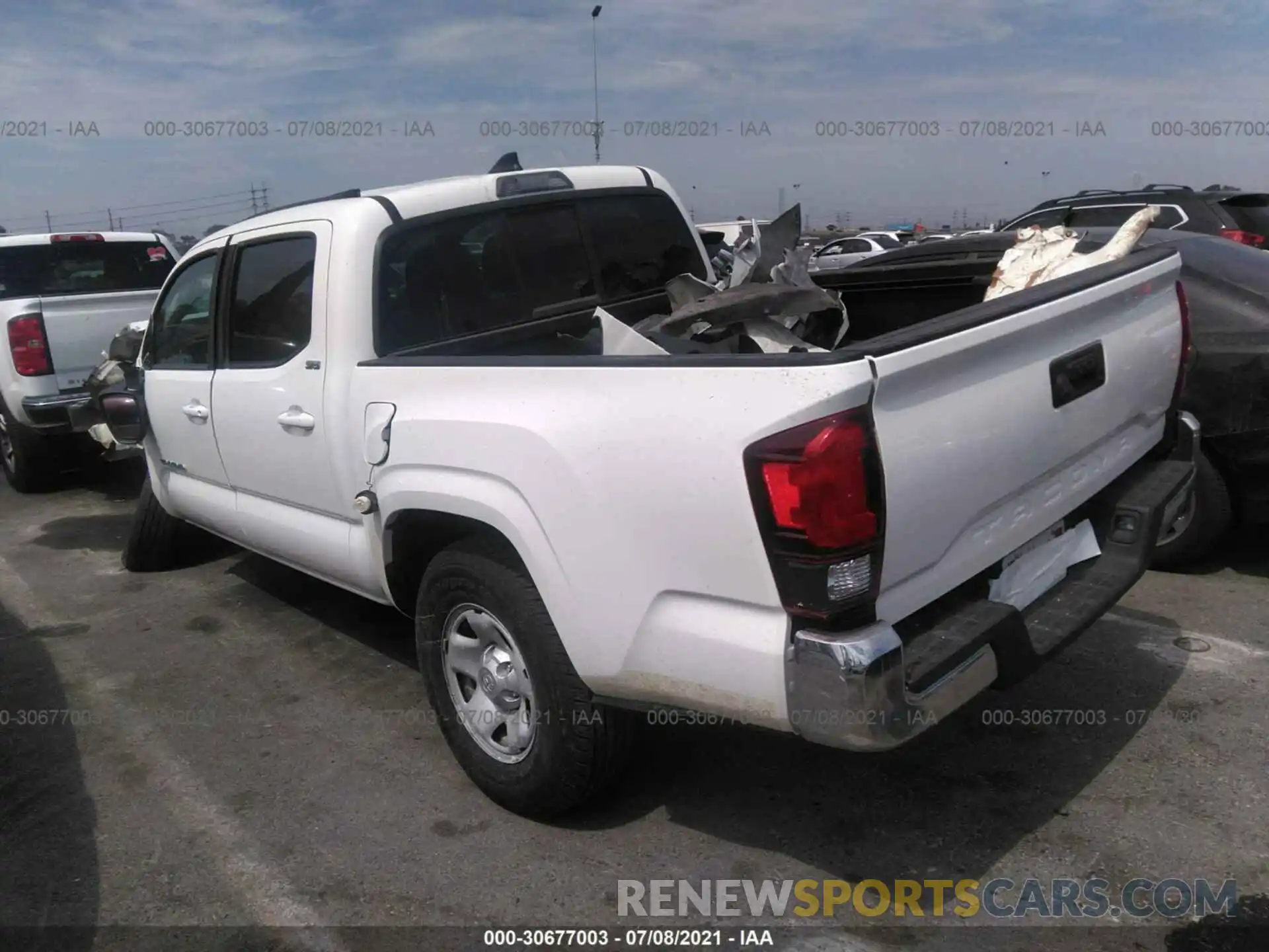 3 Photograph of a damaged car 5TFAX5GN9KX149158 TOYOTA TACOMA 2WD 2019