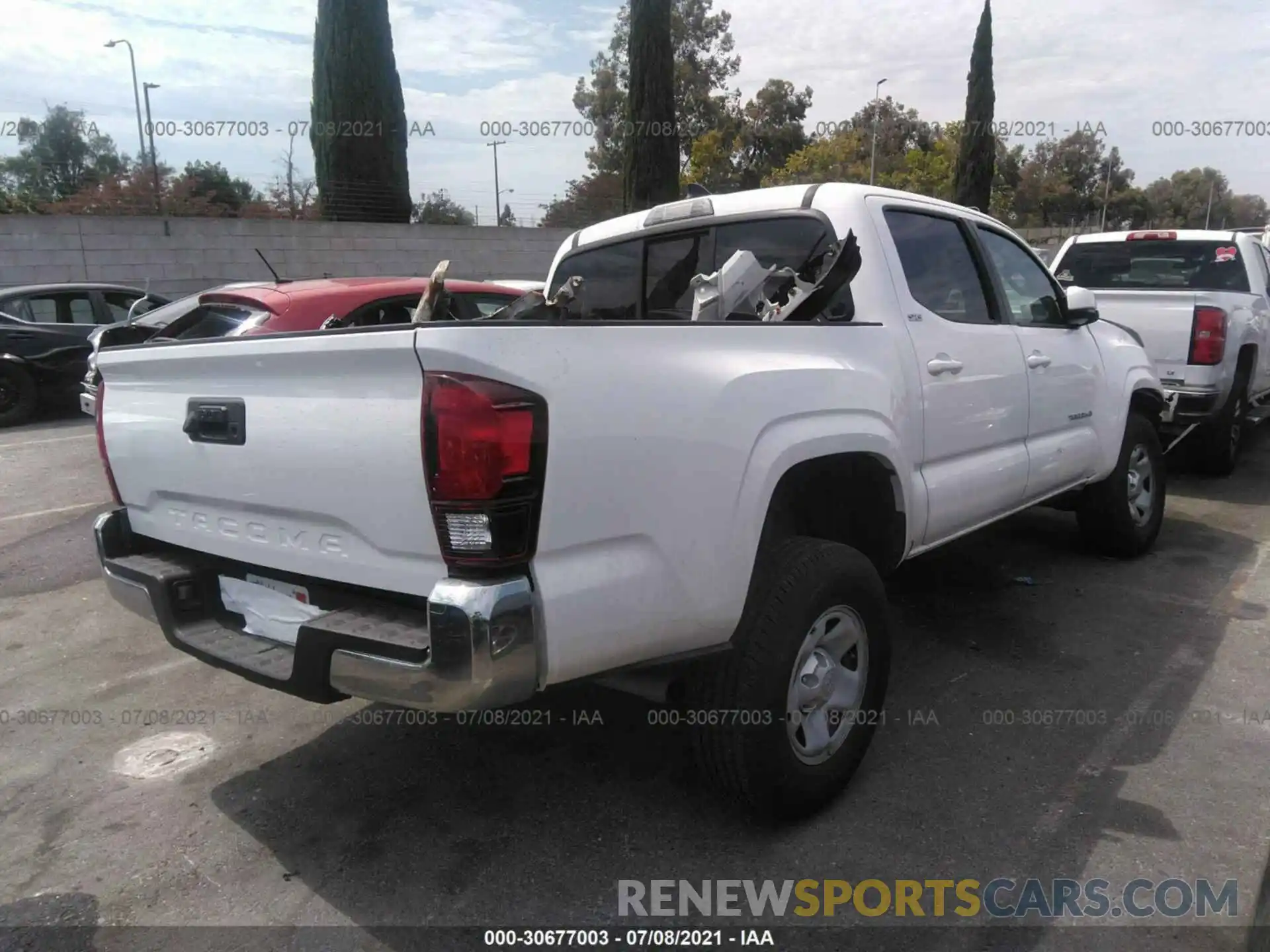 4 Photograph of a damaged car 5TFAX5GN9KX149158 TOYOTA TACOMA 2WD 2019