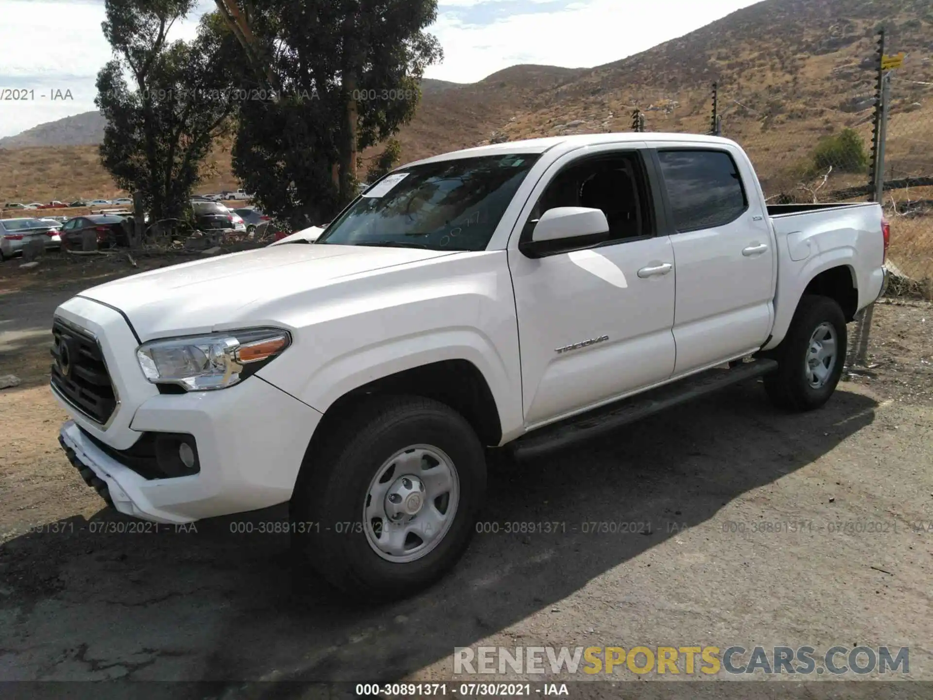 2 Photograph of a damaged car 5TFAX5GN9KX160077 TOYOTA TACOMA 2WD 2019