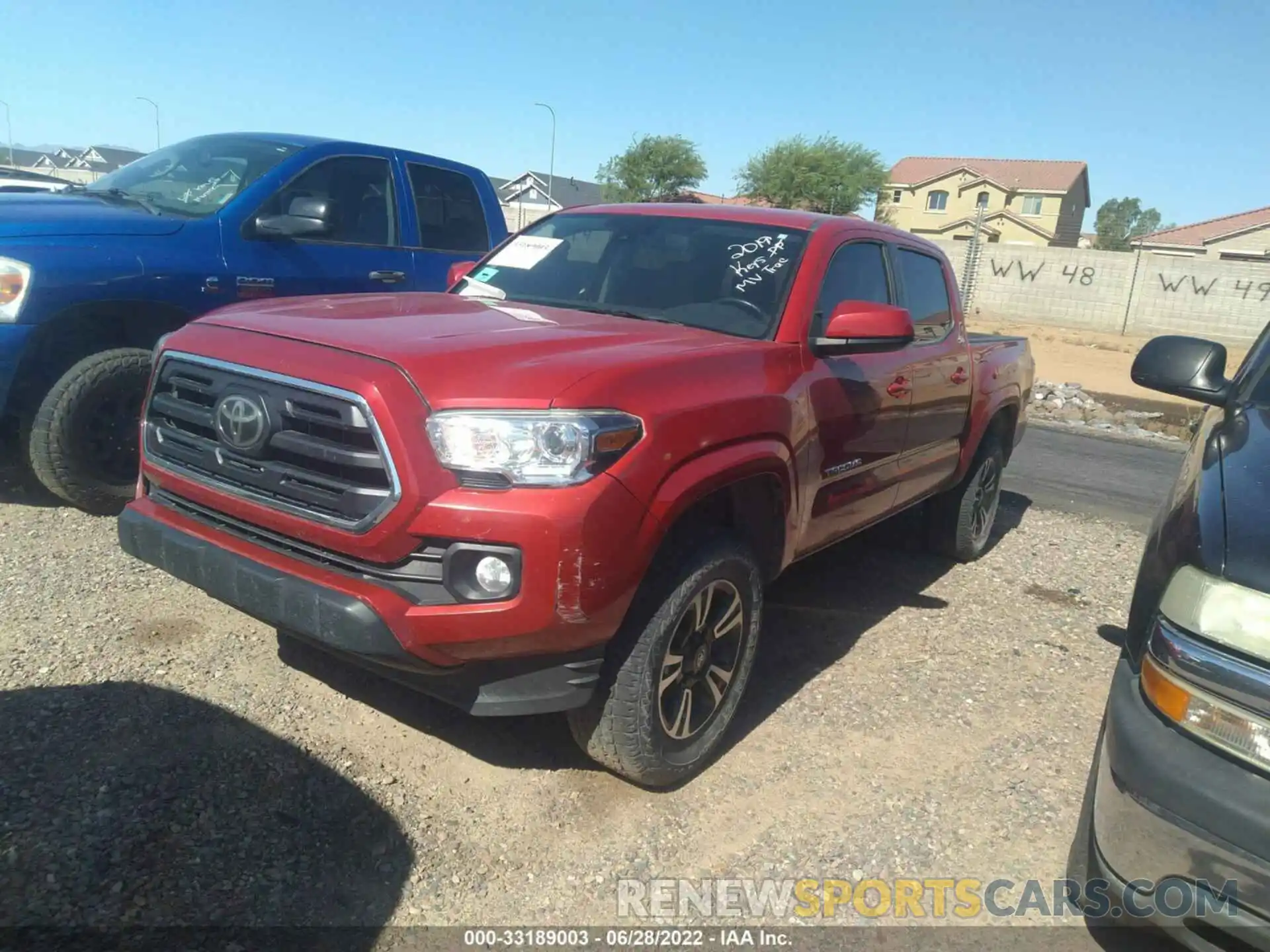 2 Photograph of a damaged car 5TFAX5GNXKX145992 TOYOTA TACOMA 2WD 2019