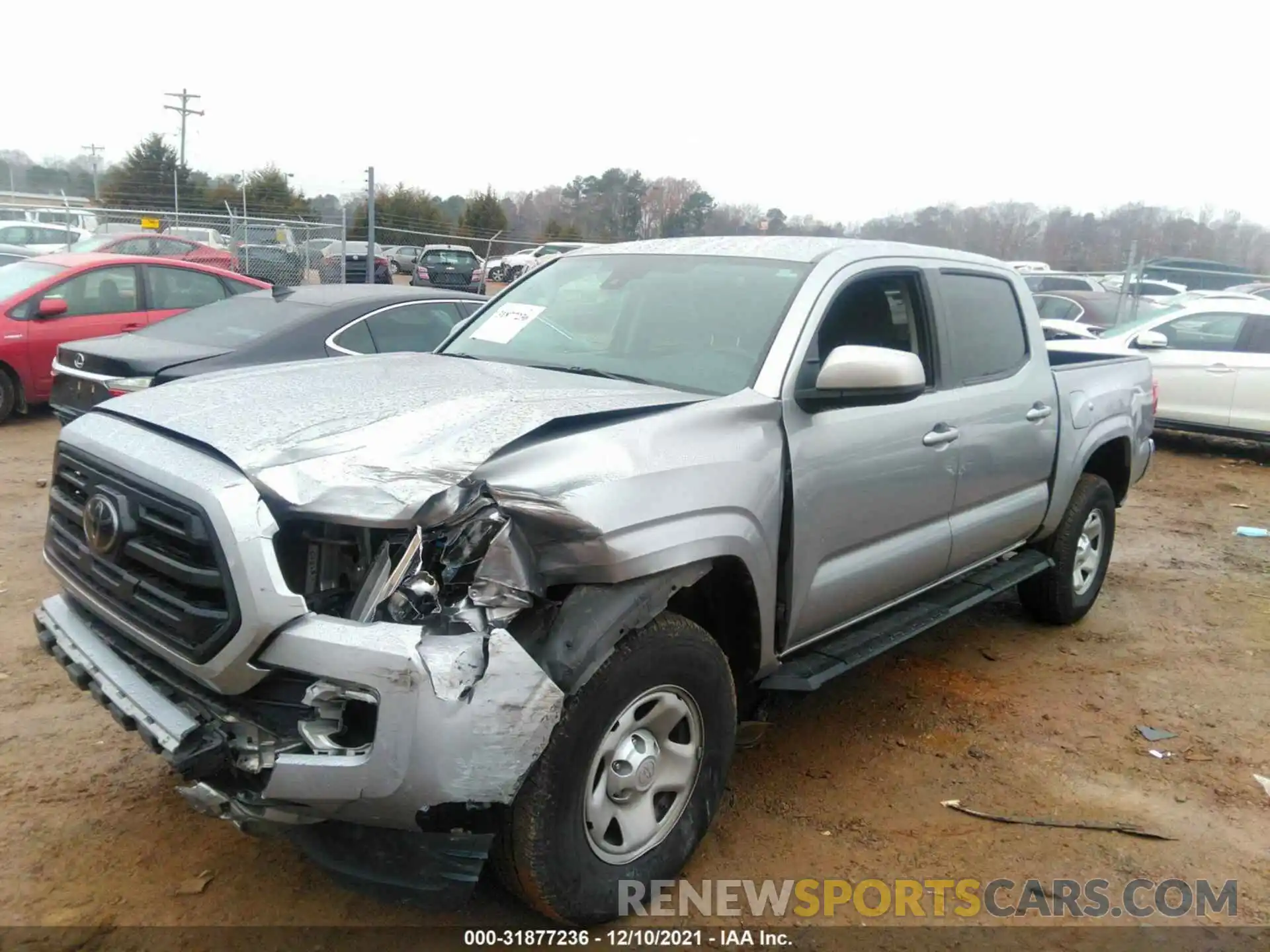 2 Photograph of a damaged car 5TFAX5GNXKX159875 TOYOTA TACOMA 2WD 2019