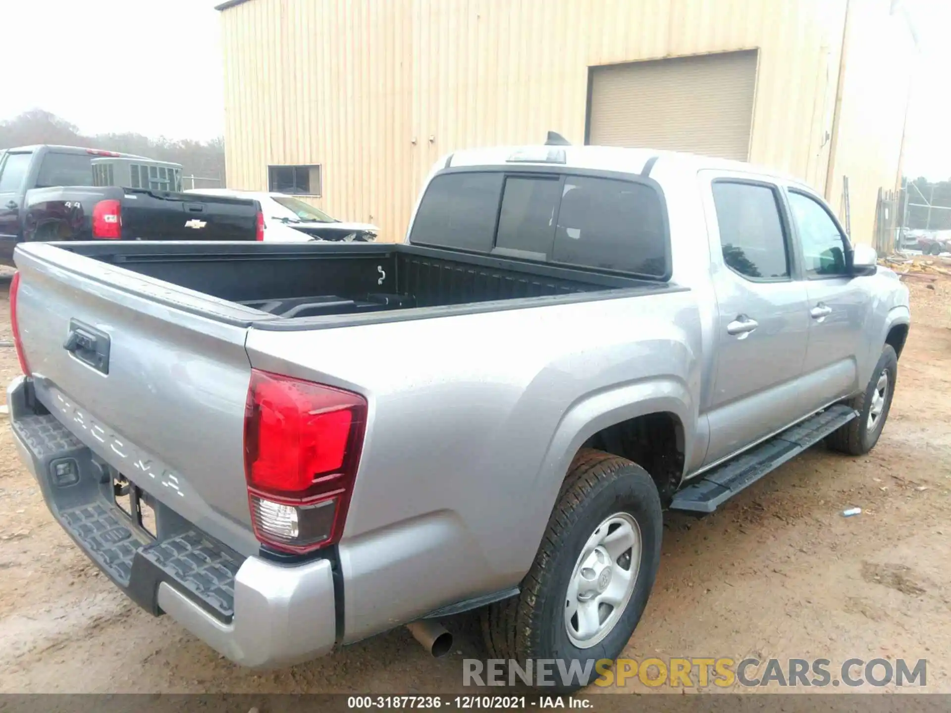 4 Photograph of a damaged car 5TFAX5GNXKX159875 TOYOTA TACOMA 2WD 2019