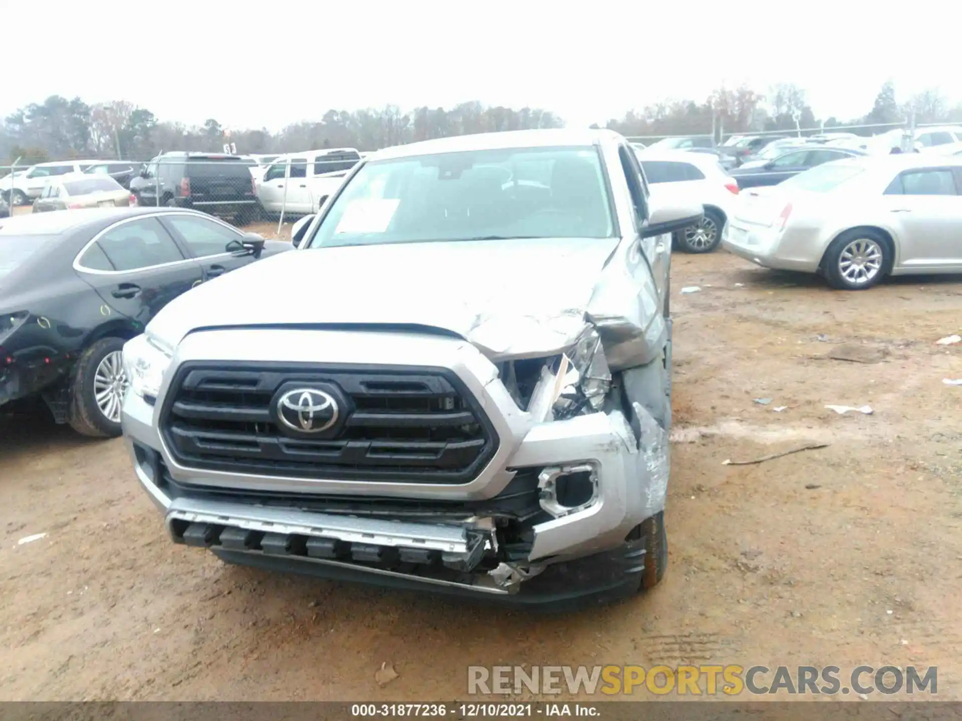 6 Photograph of a damaged car 5TFAX5GNXKX159875 TOYOTA TACOMA 2WD 2019