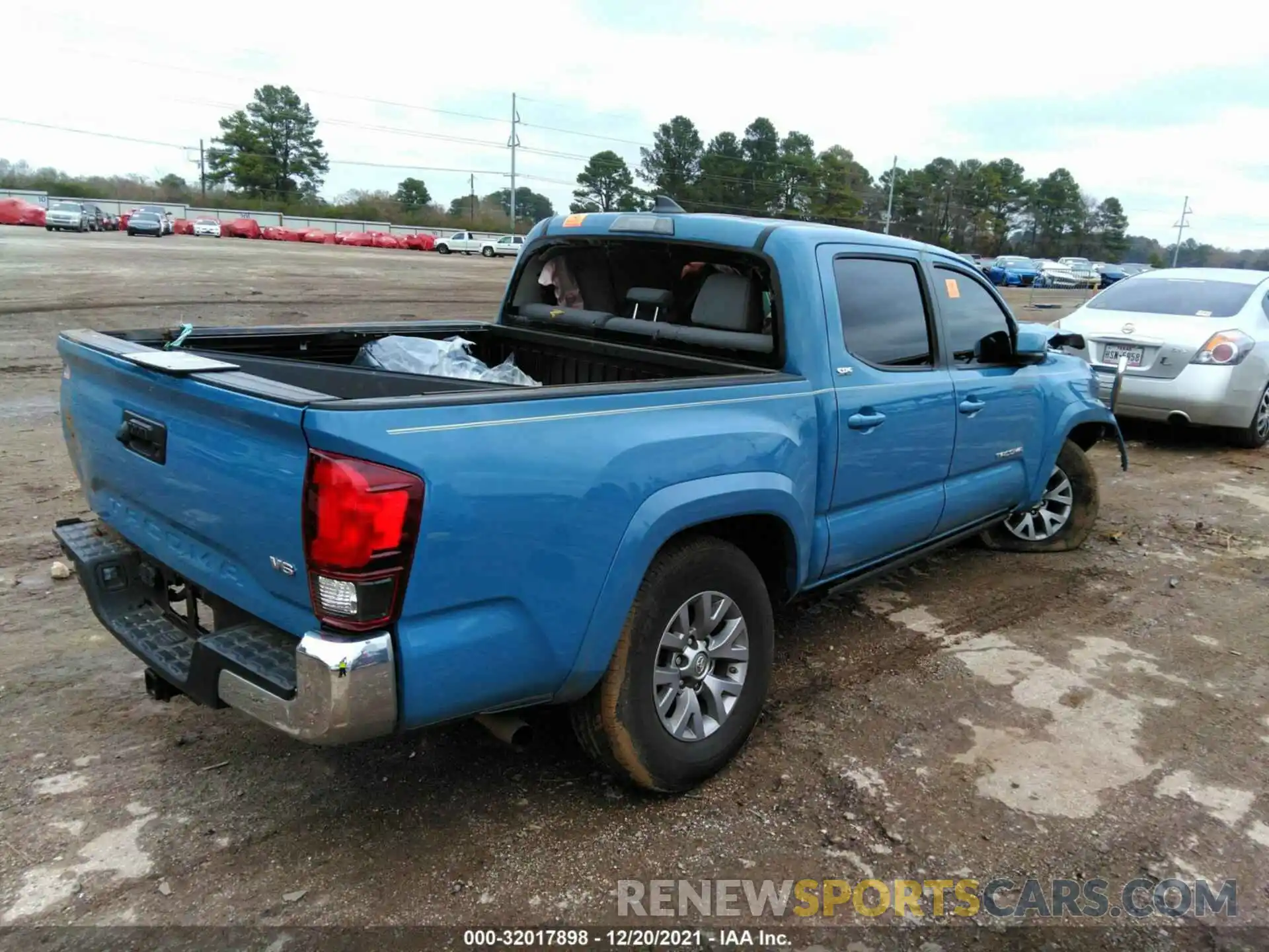 4 Photograph of a damaged car 5TFAZ5CN0KX074723 TOYOTA TACOMA 2WD 2019