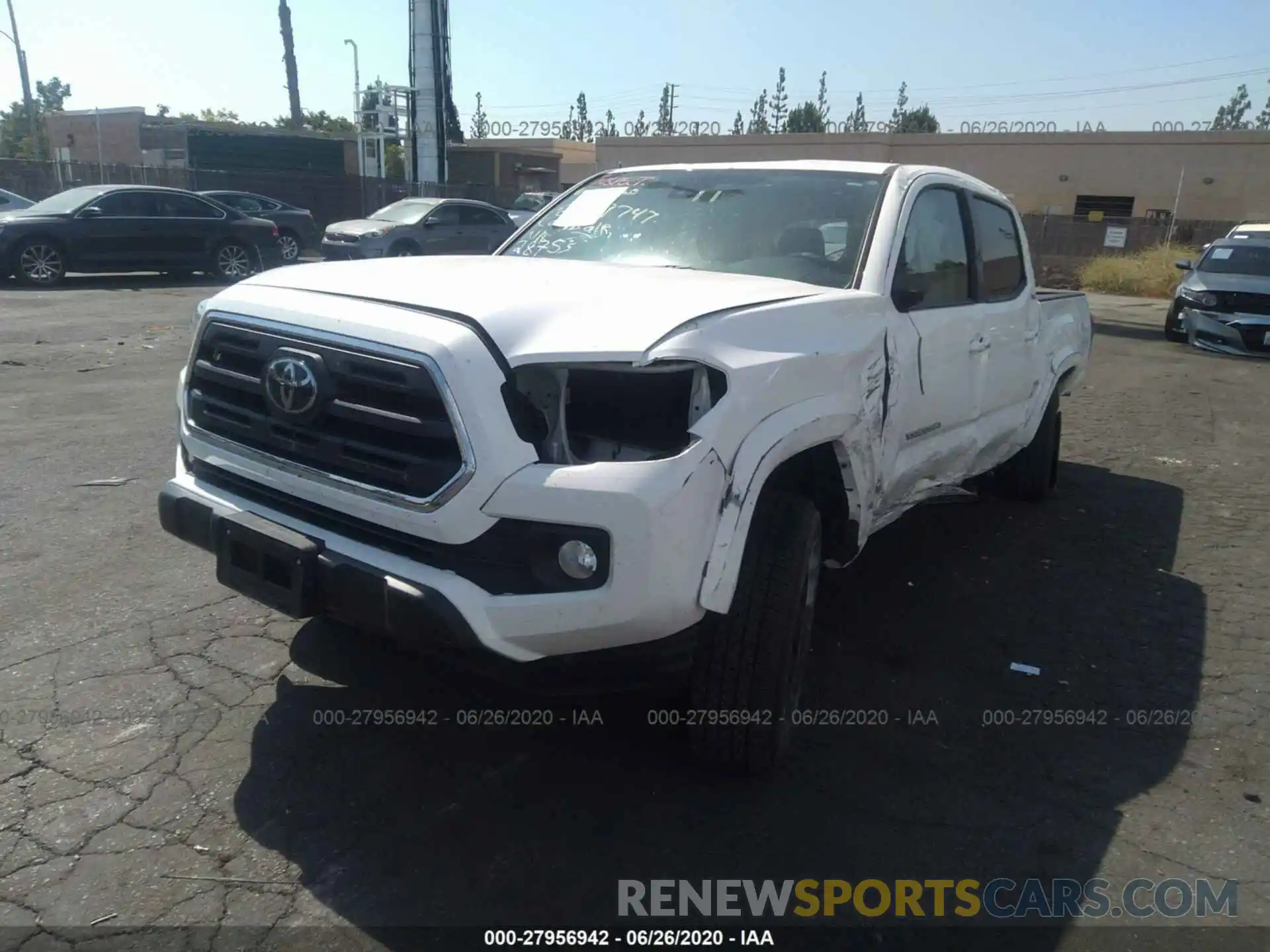 2 Photograph of a damaged car 5TFAZ5CN0KX075984 TOYOTA TACOMA 2WD 2019