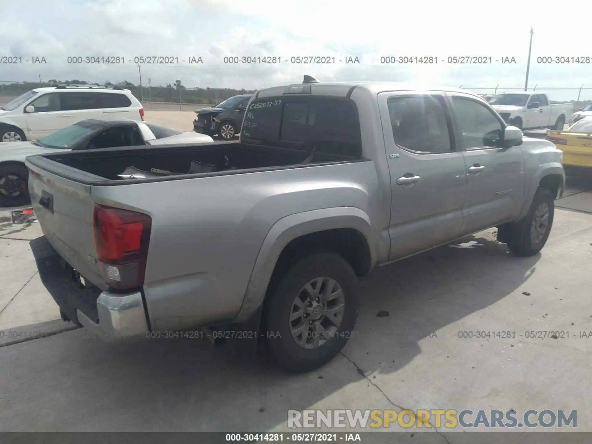 4 Photograph of a damaged car 5TFAZ5CN0KX076892 TOYOTA TACOMA 2WD 2019