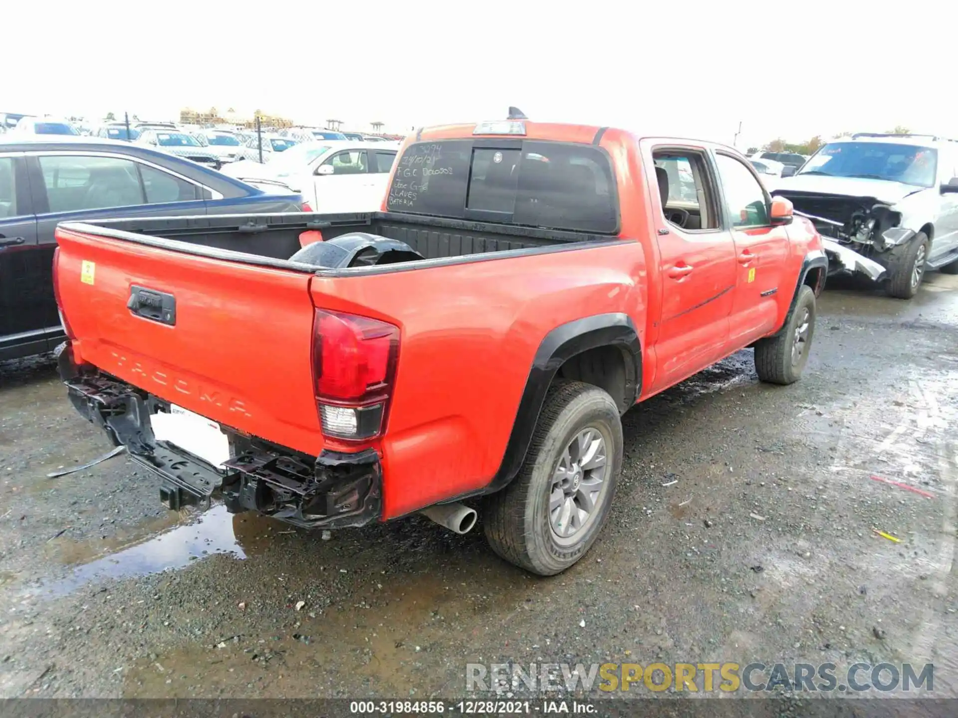 4 Photograph of a damaged car 5TFAZ5CN0KX081560 TOYOTA TACOMA 2WD 2019