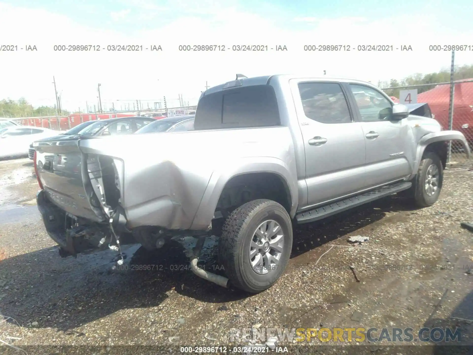 4 Photograph of a damaged car 5TFAZ5CN0KX084295 TOYOTA TACOMA 2WD 2019