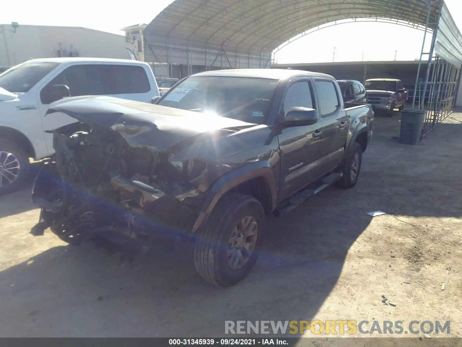 2 Photograph of a damaged car 5TFAZ5CN1KX073192 TOYOTA TACOMA 2WD 2019