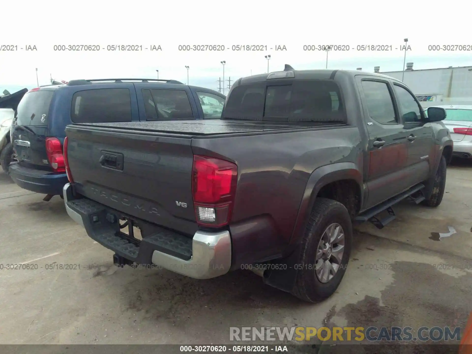 4 Photograph of a damaged car 5TFAZ5CN1KX079672 TOYOTA TACOMA 2WD 2019