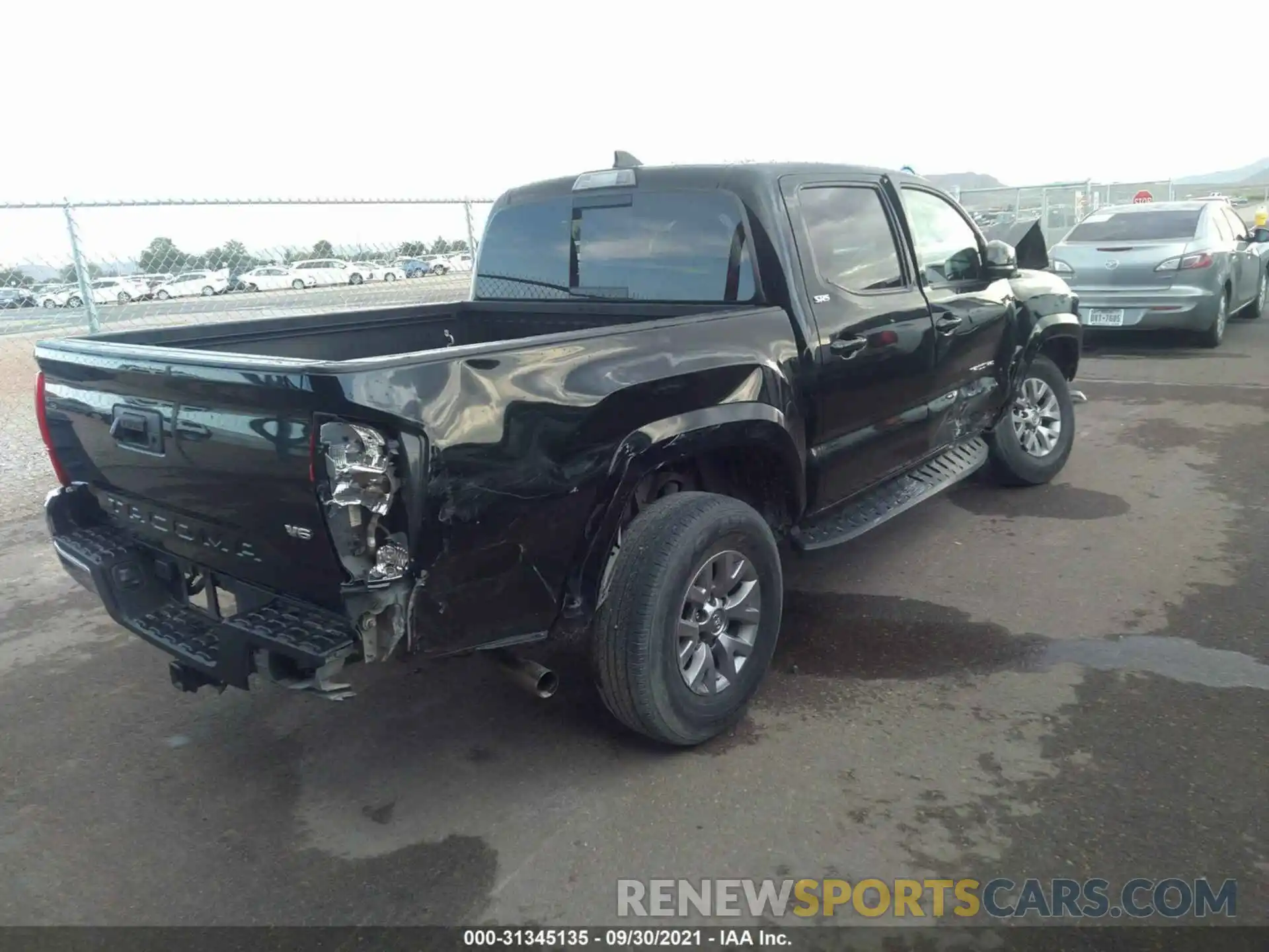 4 Photograph of a damaged car 5TFAZ5CN1KX081163 TOYOTA TACOMA 2WD 2019