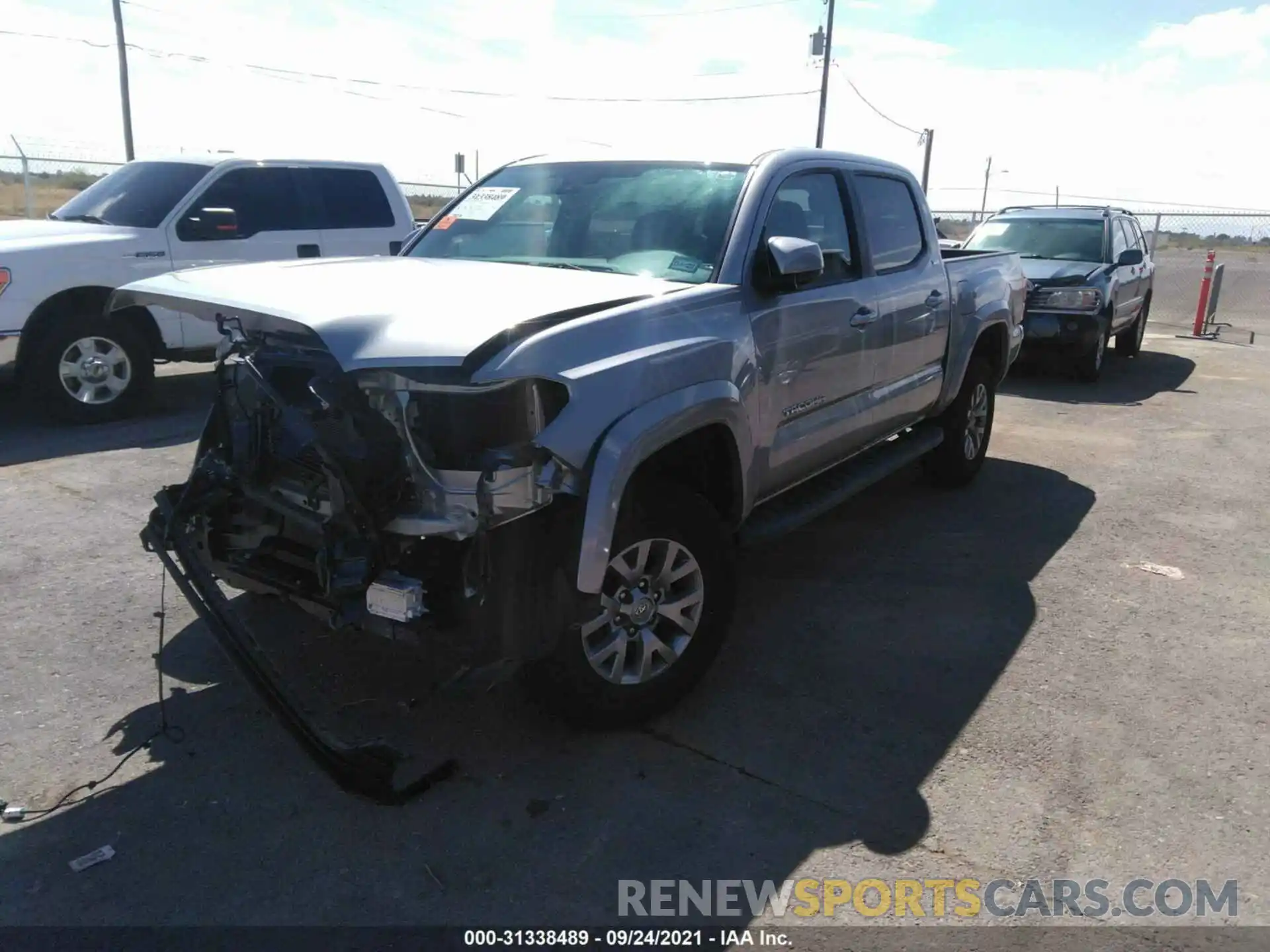 2 Photograph of a damaged car 5TFAZ5CN2KX078854 TOYOTA TACOMA 2WD 2019