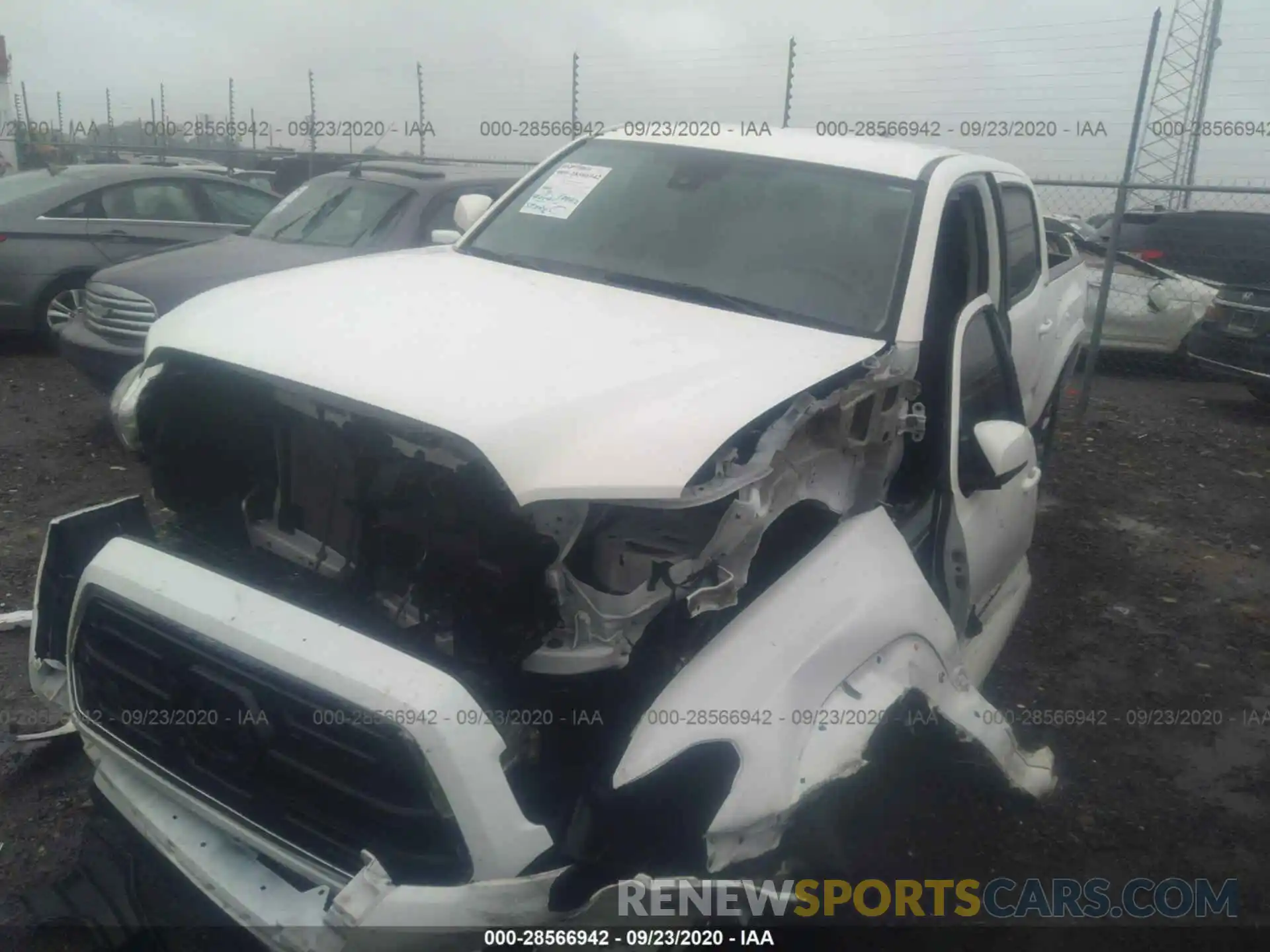 2 Photograph of a damaged car 5TFAZ5CN4KX073445 TOYOTA TACOMA 2WD 2019