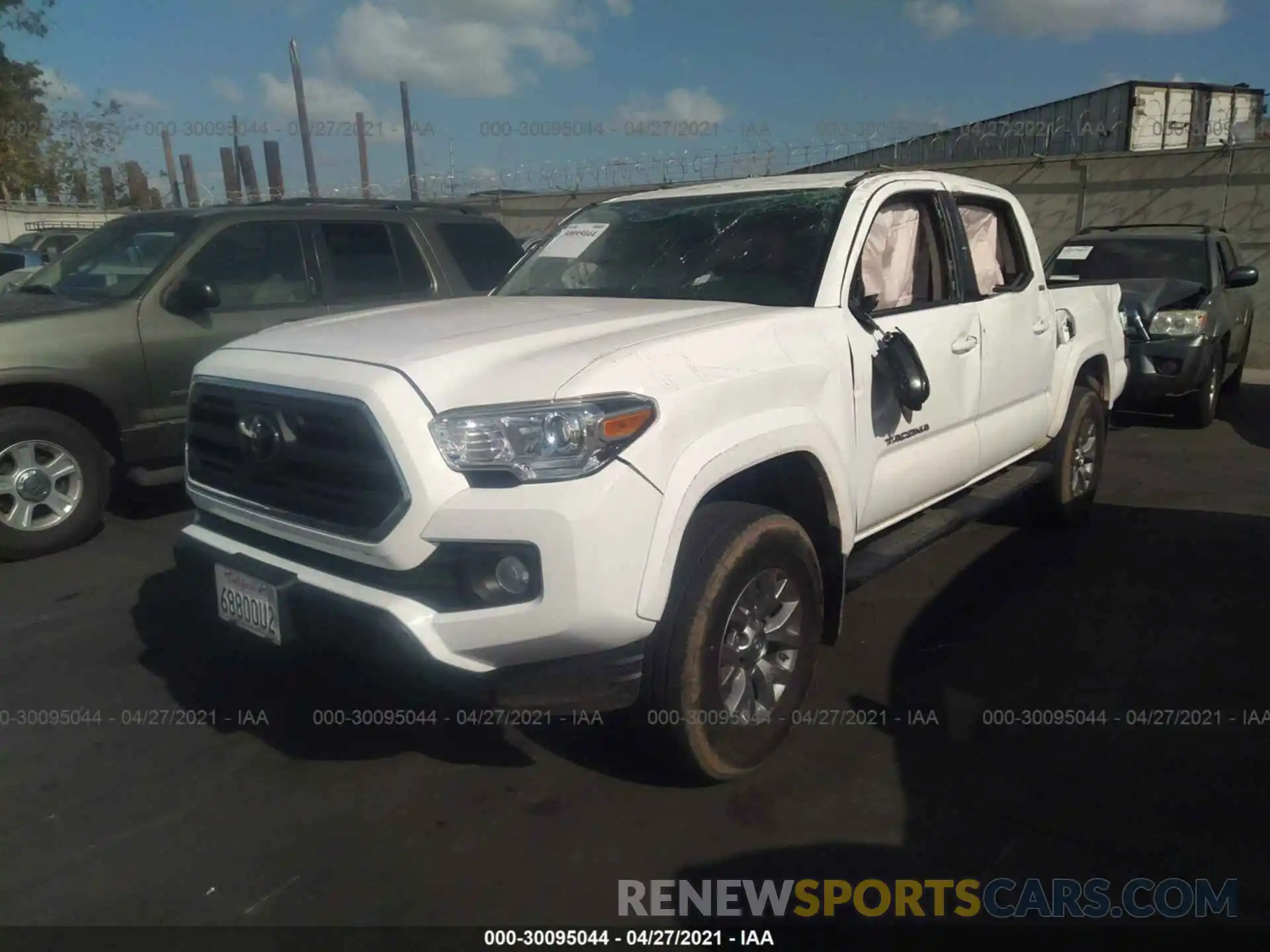 2 Photograph of a damaged car 5TFAZ5CN4KX083473 TOYOTA TACOMA 2WD 2019