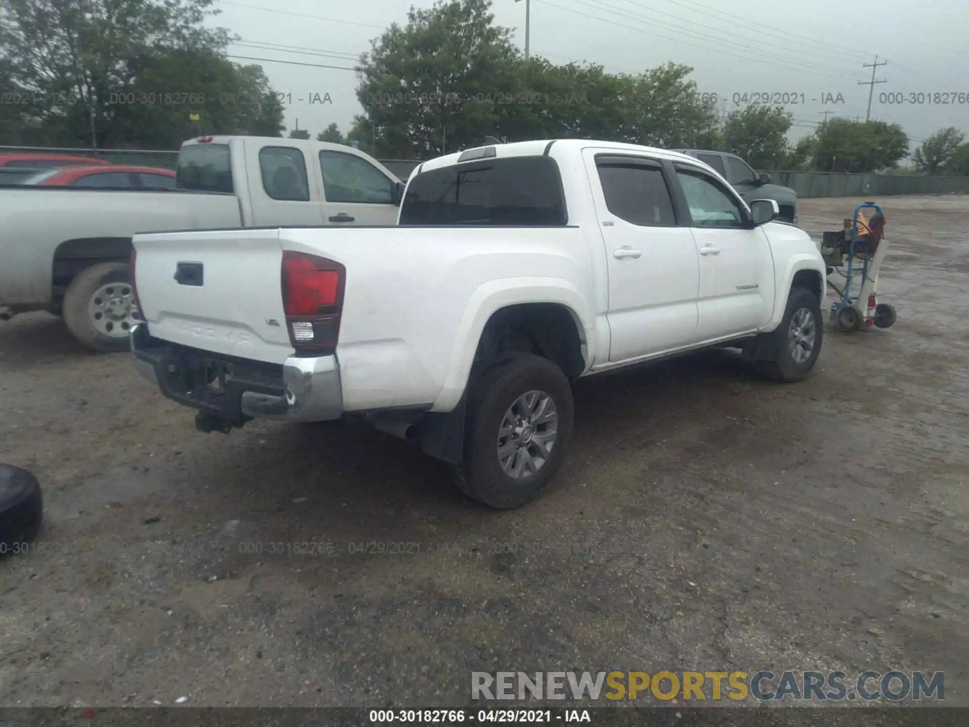 4 Photograph of a damaged car 5TFAZ5CN4KX084543 TOYOTA TACOMA 2WD 2019