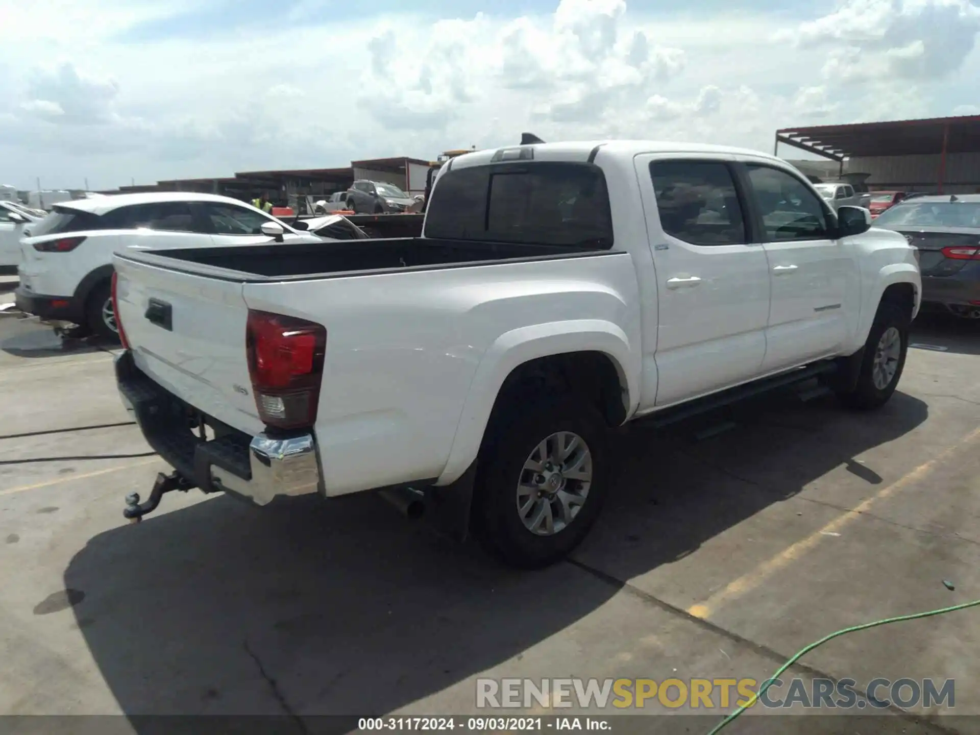 4 Photograph of a damaged car 5TFAZ5CN4KX086213 TOYOTA TACOMA 2WD 2019