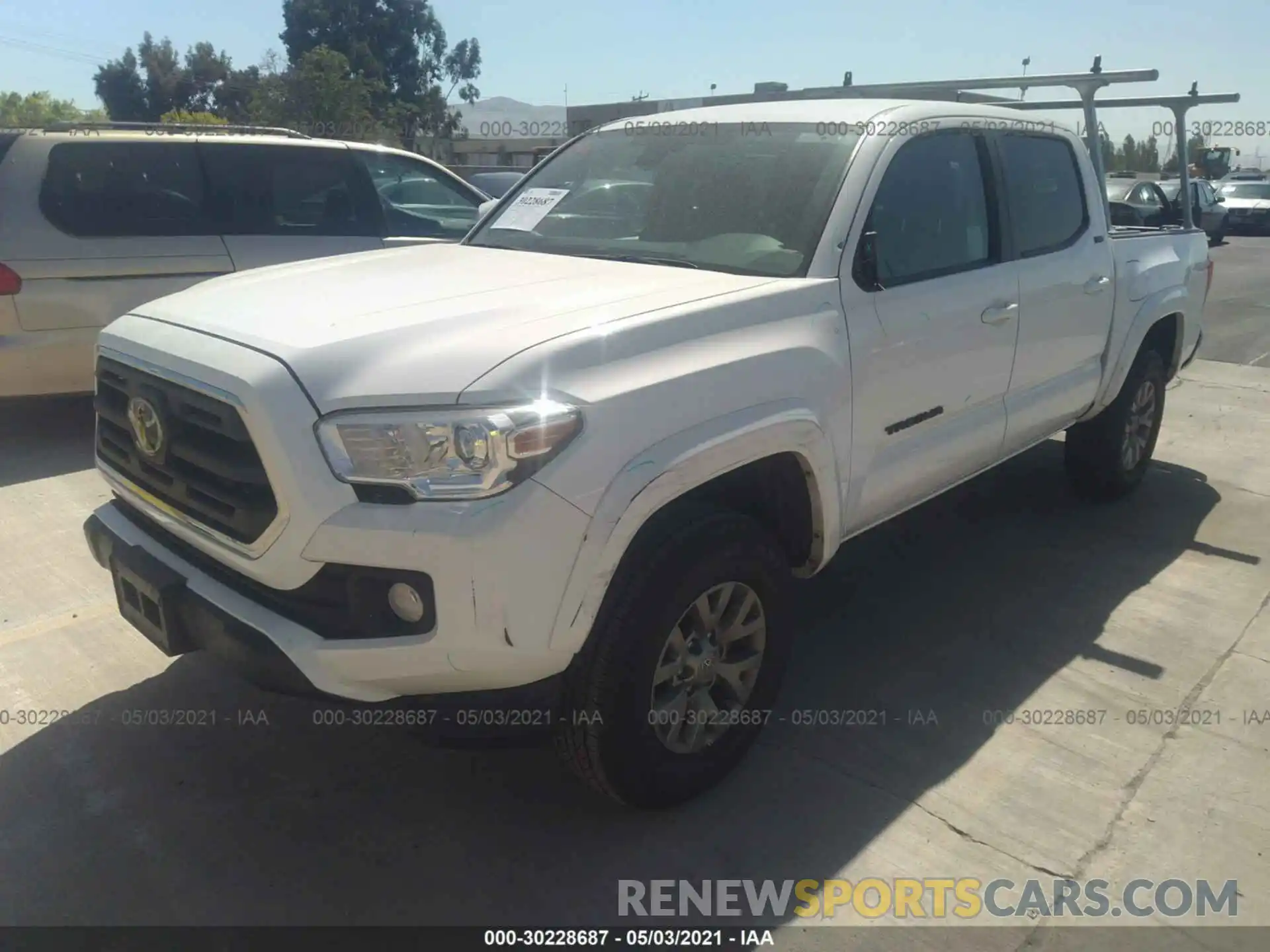 2 Photograph of a damaged car 5TFAZ5CN5KX085670 TOYOTA TACOMA 2WD 2019