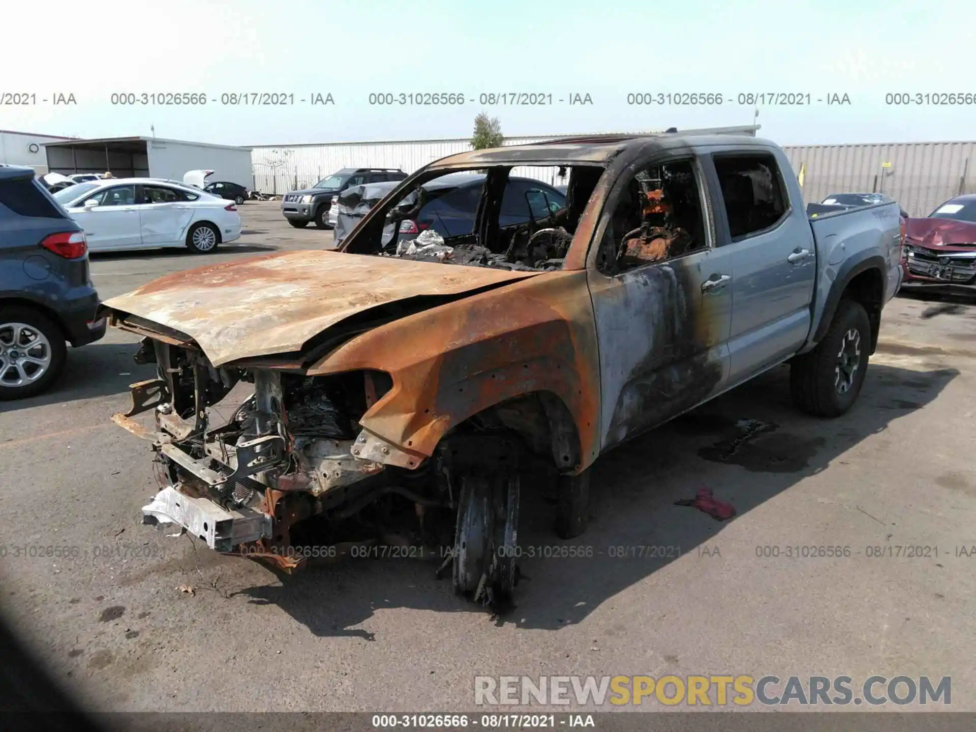 2 Photograph of a damaged car 5TFAZ5CN6KX075794 TOYOTA TACOMA 2WD 2019