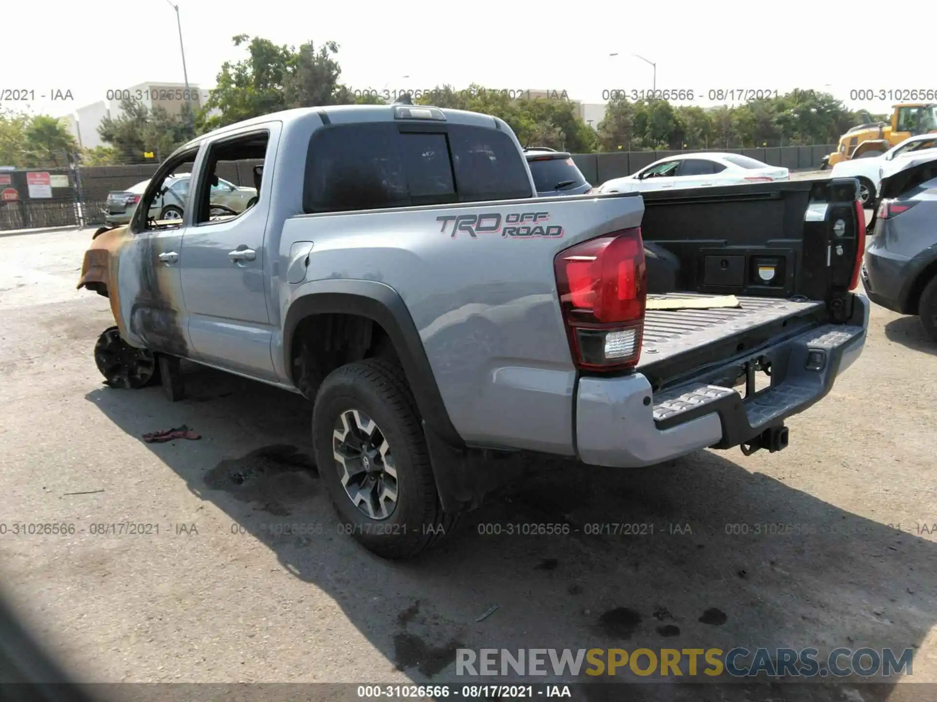 3 Photograph of a damaged car 5TFAZ5CN6KX075794 TOYOTA TACOMA 2WD 2019