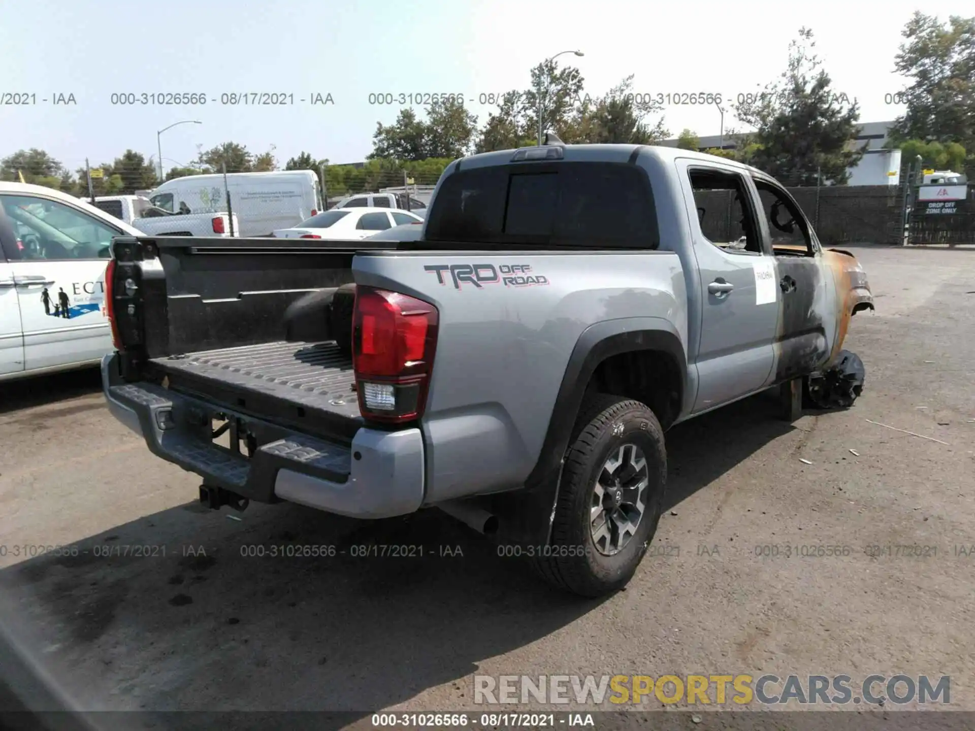 4 Photograph of a damaged car 5TFAZ5CN6KX075794 TOYOTA TACOMA 2WD 2019