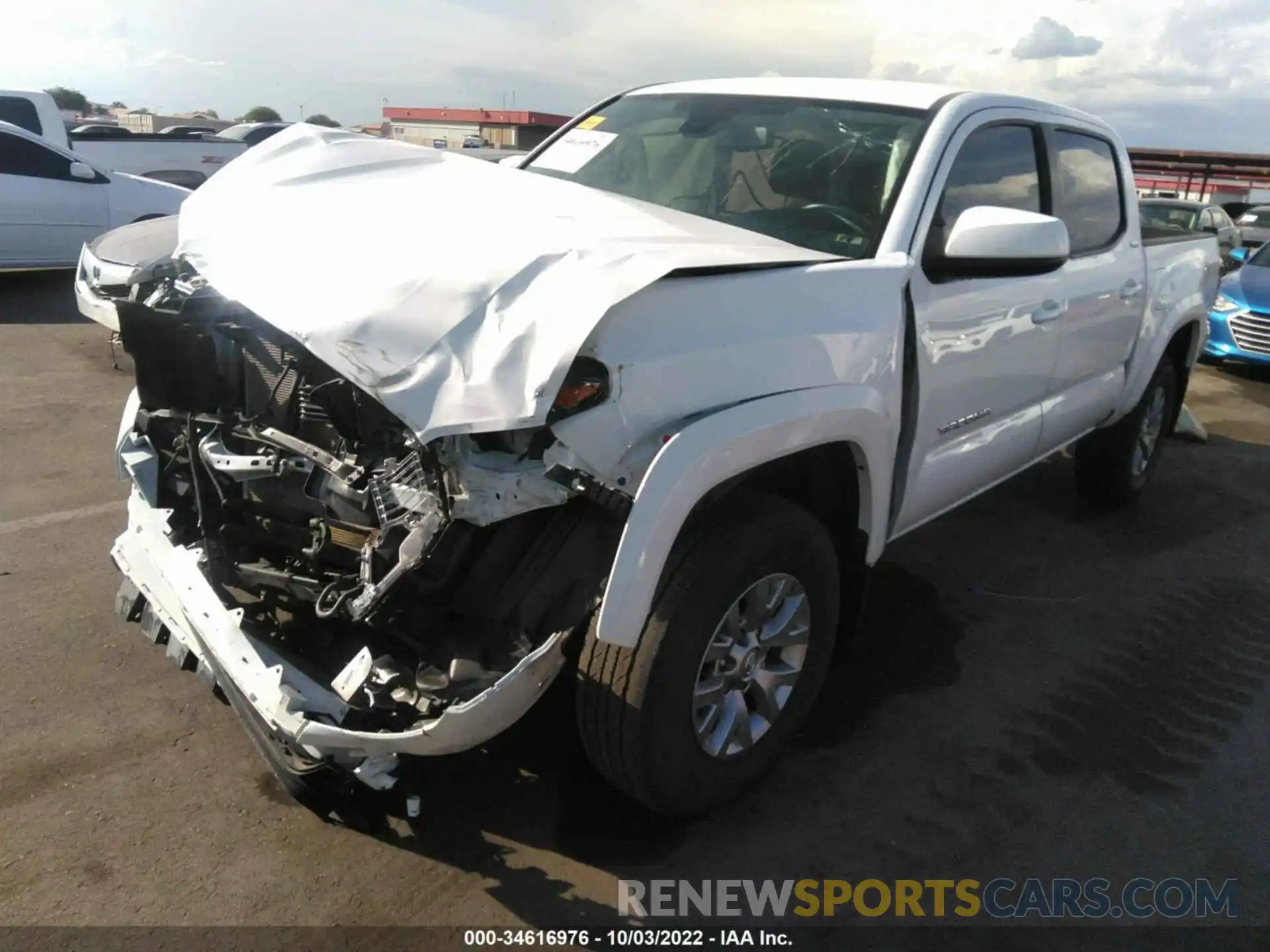 2 Photograph of a damaged car 5TFAZ5CN6KX077142 TOYOTA TACOMA 2WD 2019