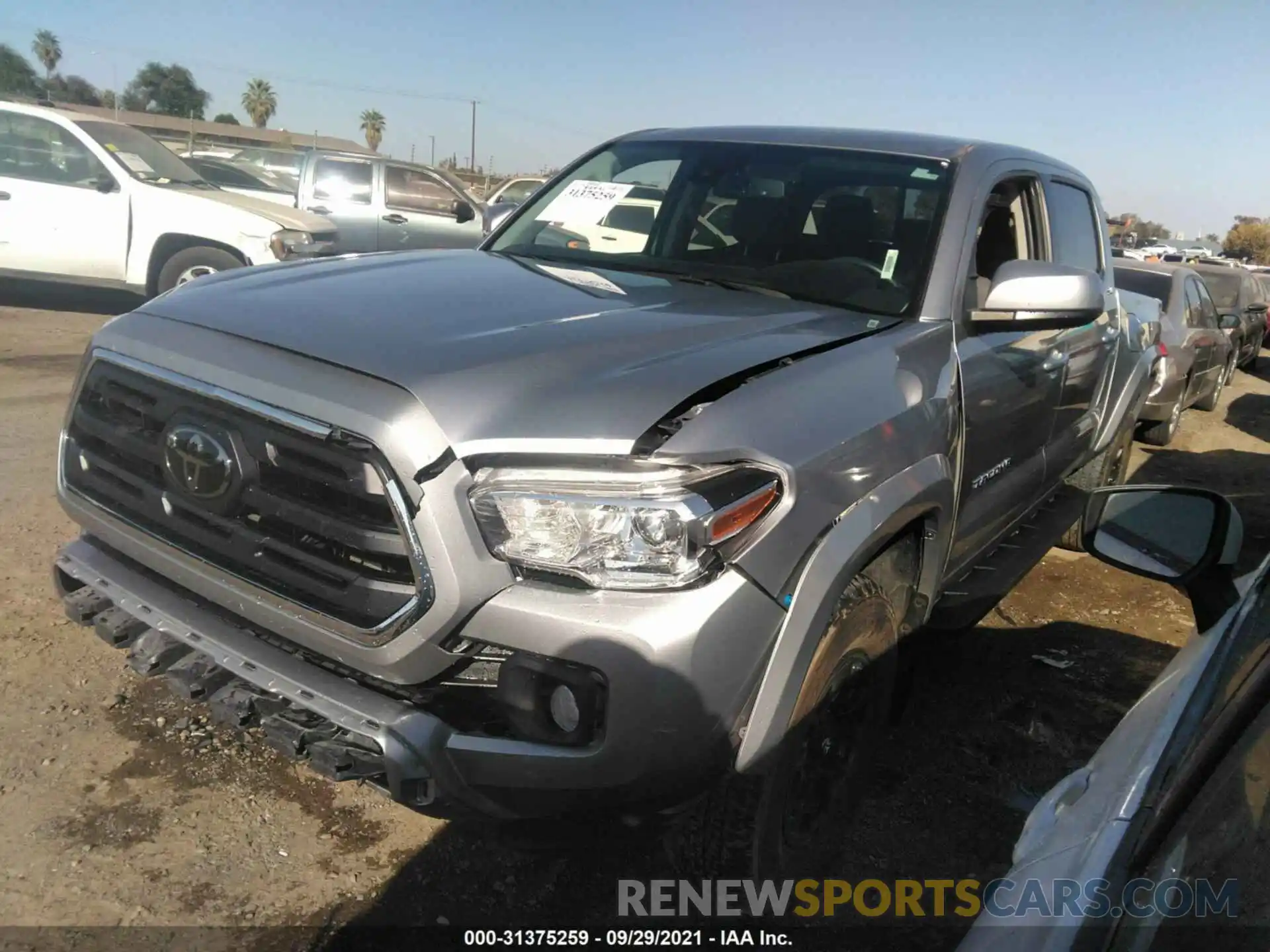 2 Photograph of a damaged car 5TFAZ5CN6KX077223 TOYOTA TACOMA 2WD 2019