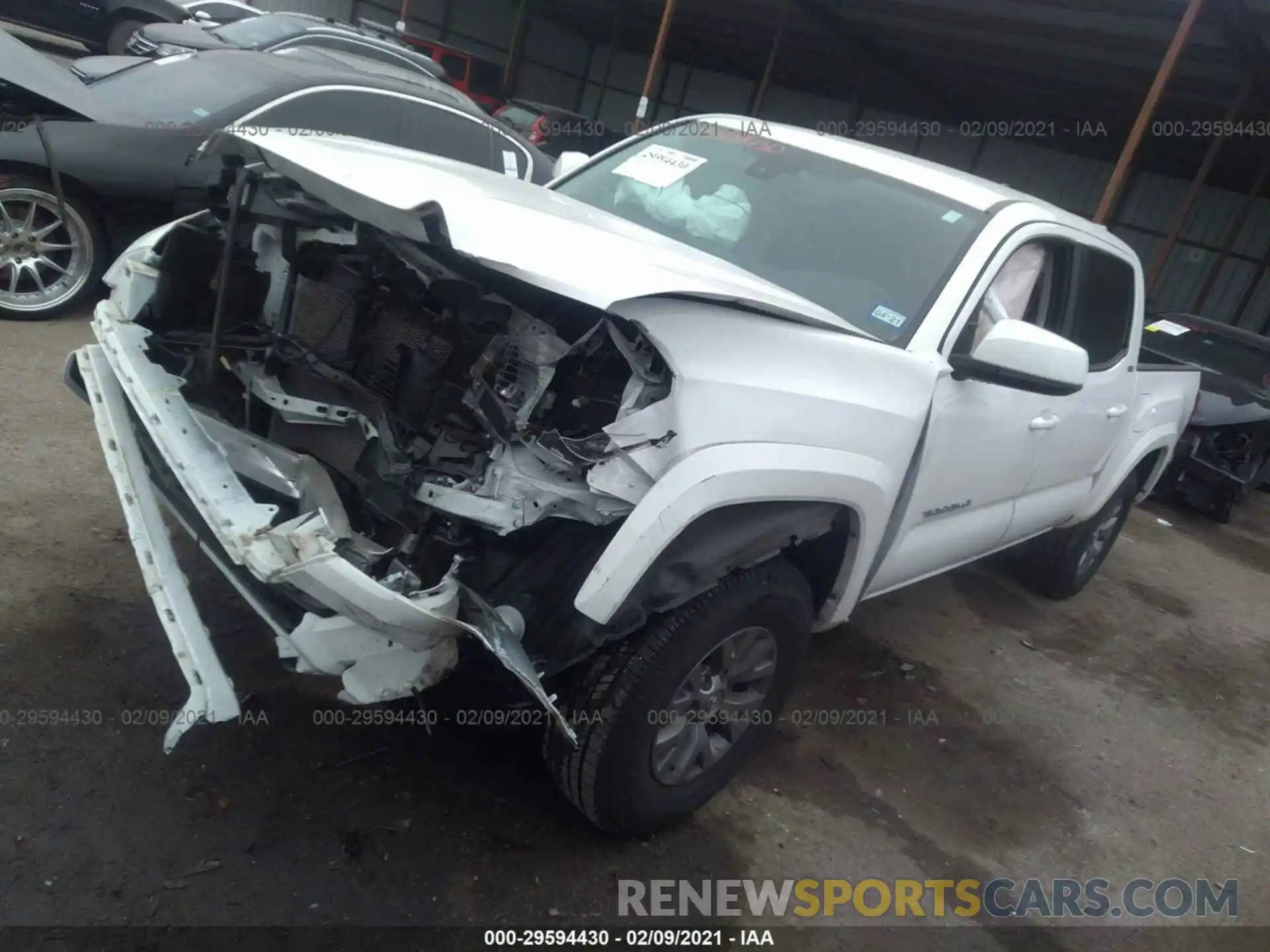 2 Photograph of a damaged car 5TFAZ5CN6KX082602 TOYOTA TACOMA 2WD 2019