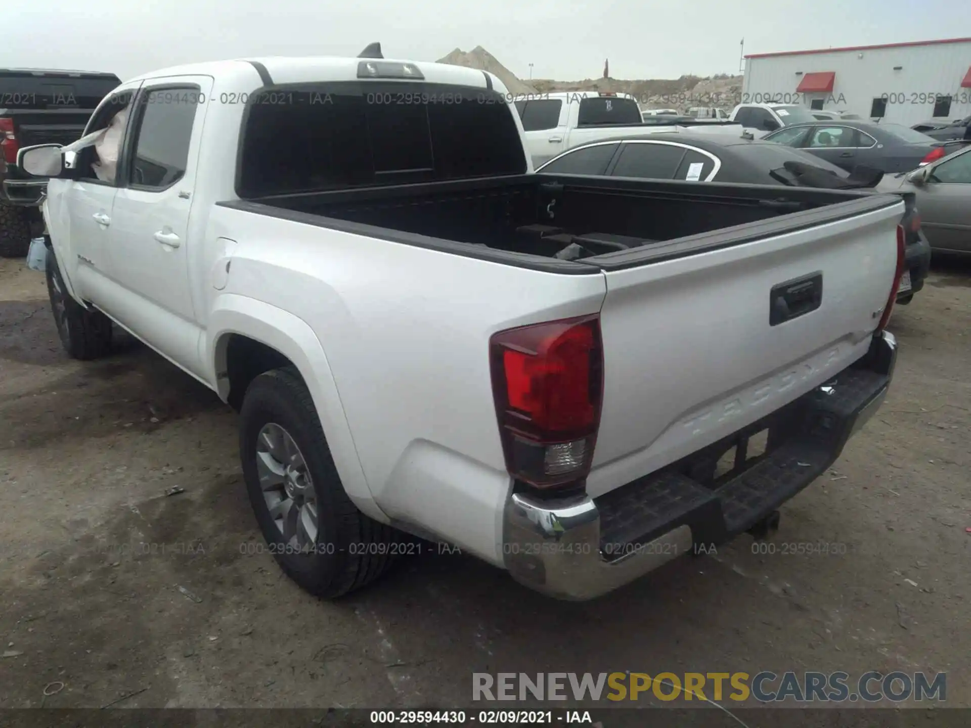 3 Photograph of a damaged car 5TFAZ5CN6KX082602 TOYOTA TACOMA 2WD 2019