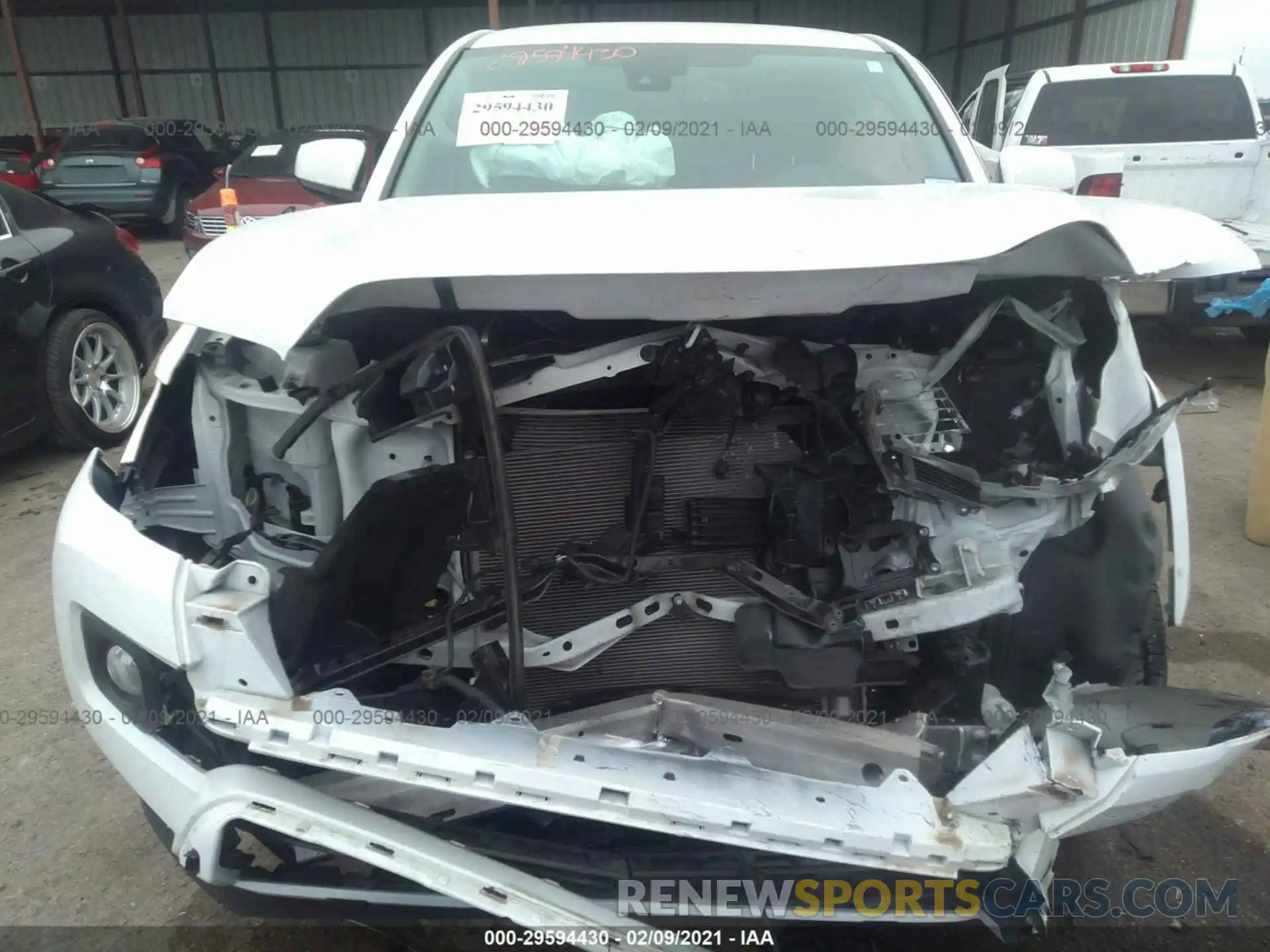 6 Photograph of a damaged car 5TFAZ5CN6KX082602 TOYOTA TACOMA 2WD 2019