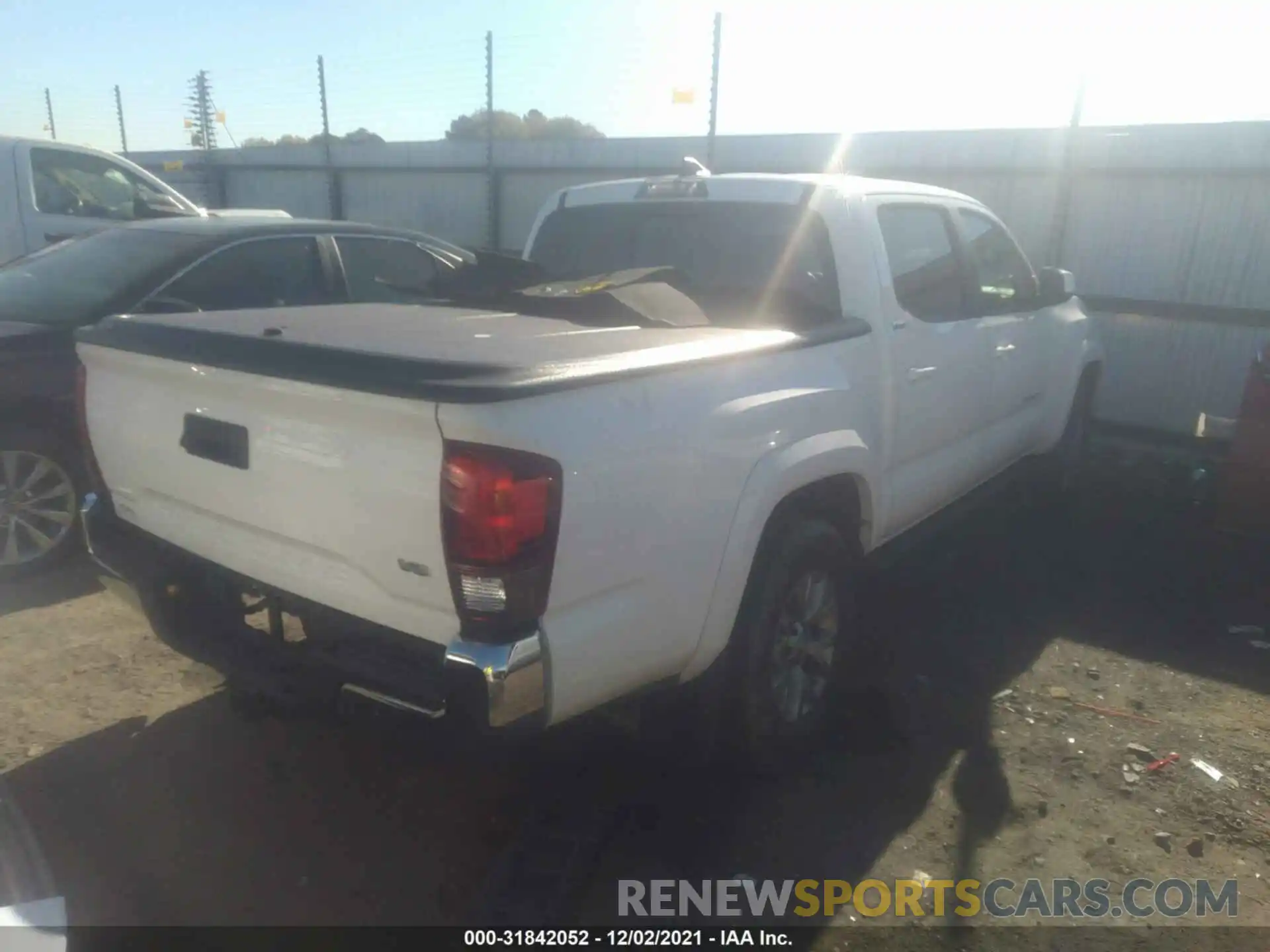 4 Photograph of a damaged car 5TFAZ5CN9KX072002 TOYOTA TACOMA 2WD 2019