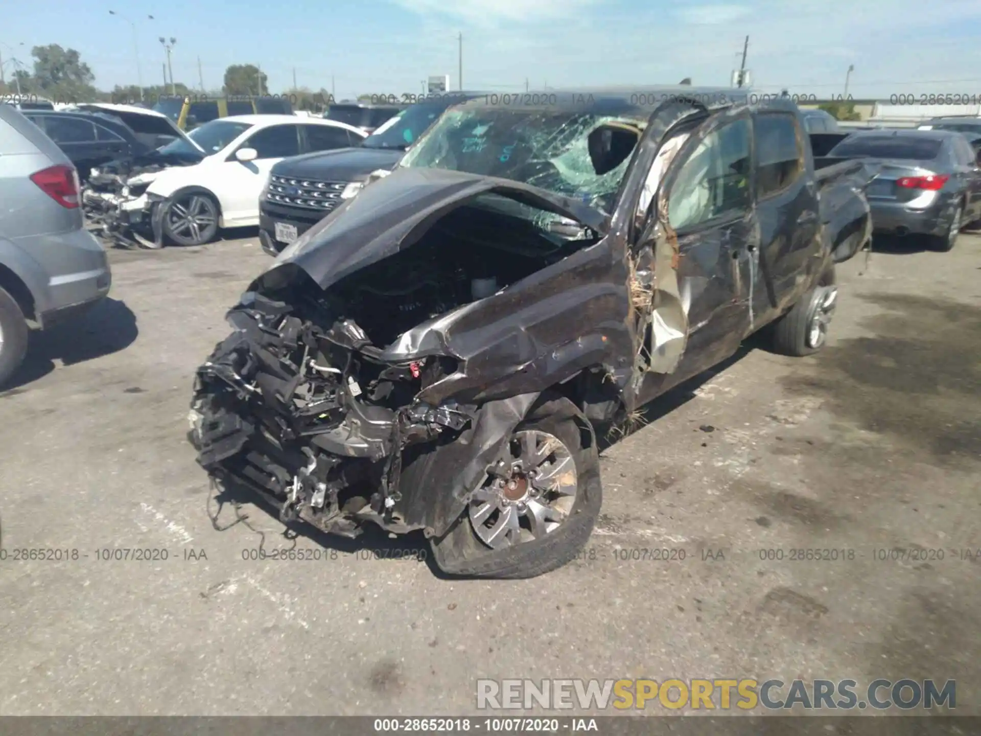 2 Photograph of a damaged car 5TFAZ5CN9KX077796 TOYOTA TACOMA 2WD 2019