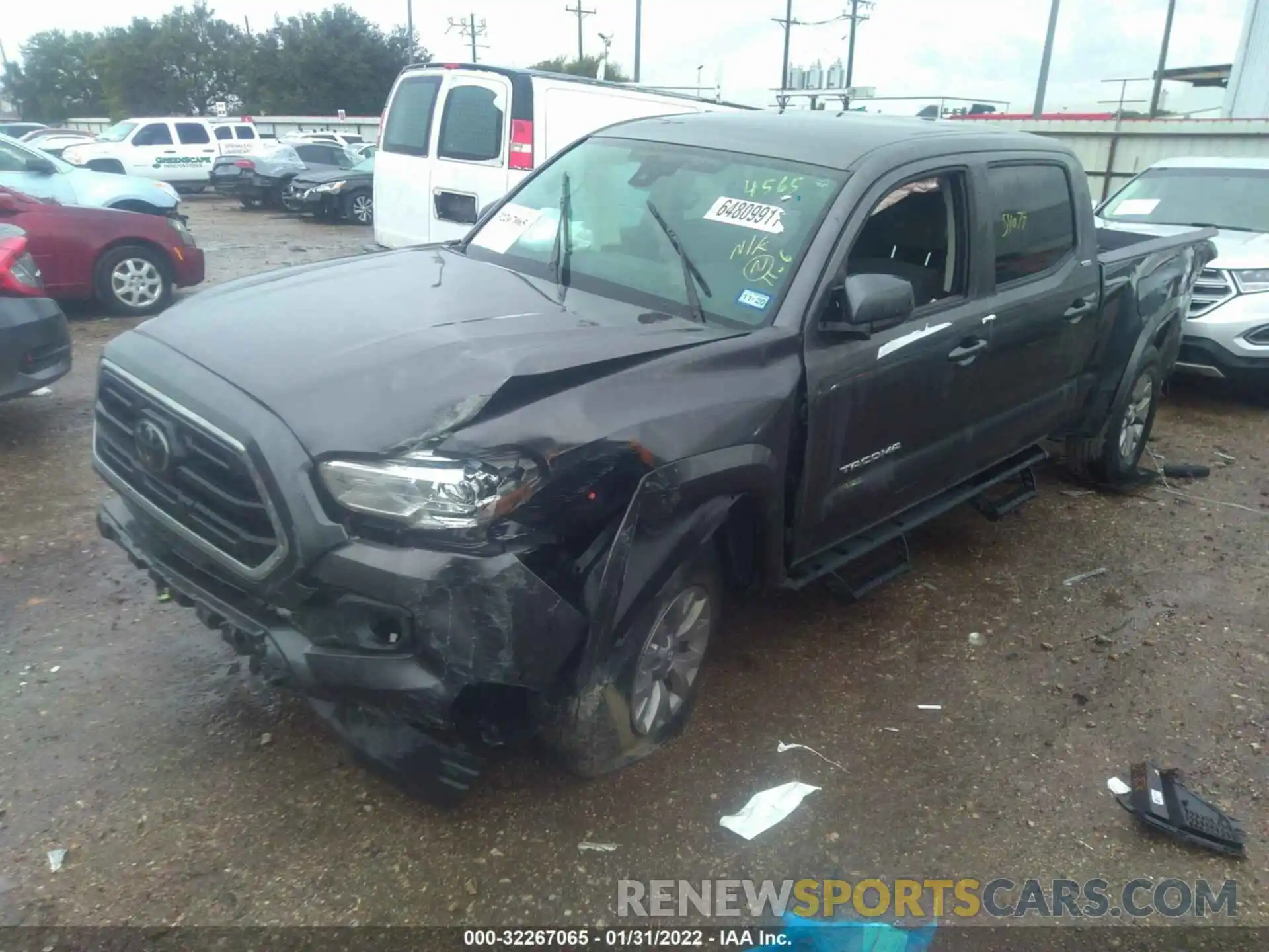 2 Photograph of a damaged car 5TFBZ5DN6KX004565 TOYOTA TACOMA 2WD 2019