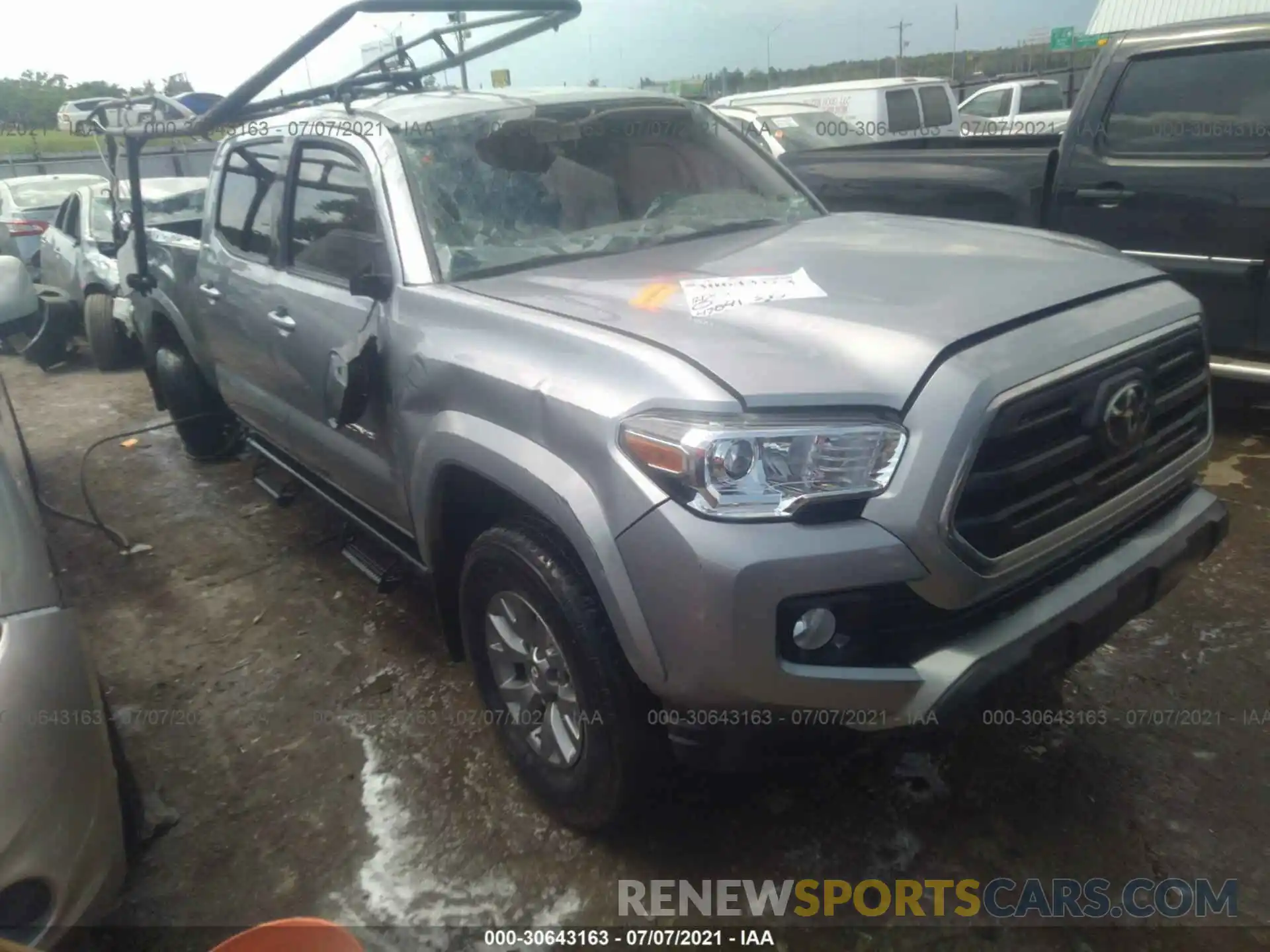 1 Photograph of a damaged car 5TFBZ5DN6KX004677 TOYOTA TACOMA 2WD 2019