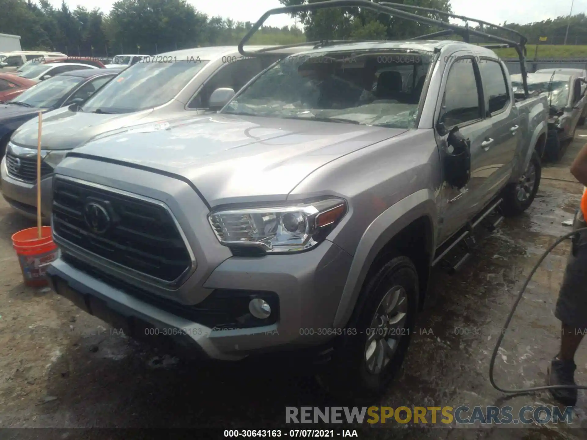 2 Photograph of a damaged car 5TFBZ5DN6KX004677 TOYOTA TACOMA 2WD 2019