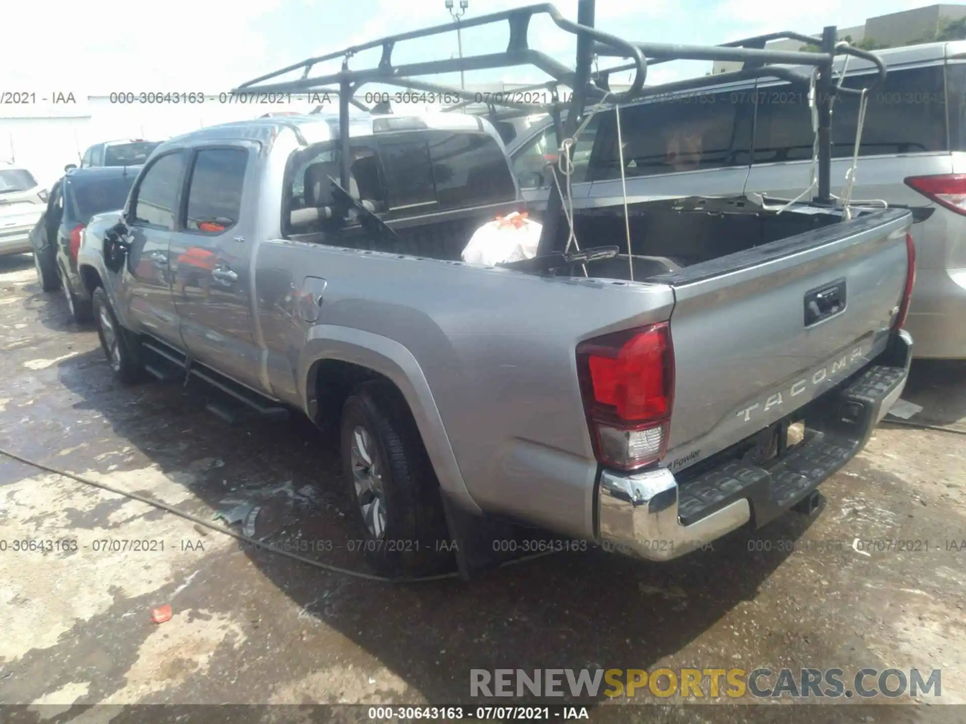 3 Photograph of a damaged car 5TFBZ5DN6KX004677 TOYOTA TACOMA 2WD 2019