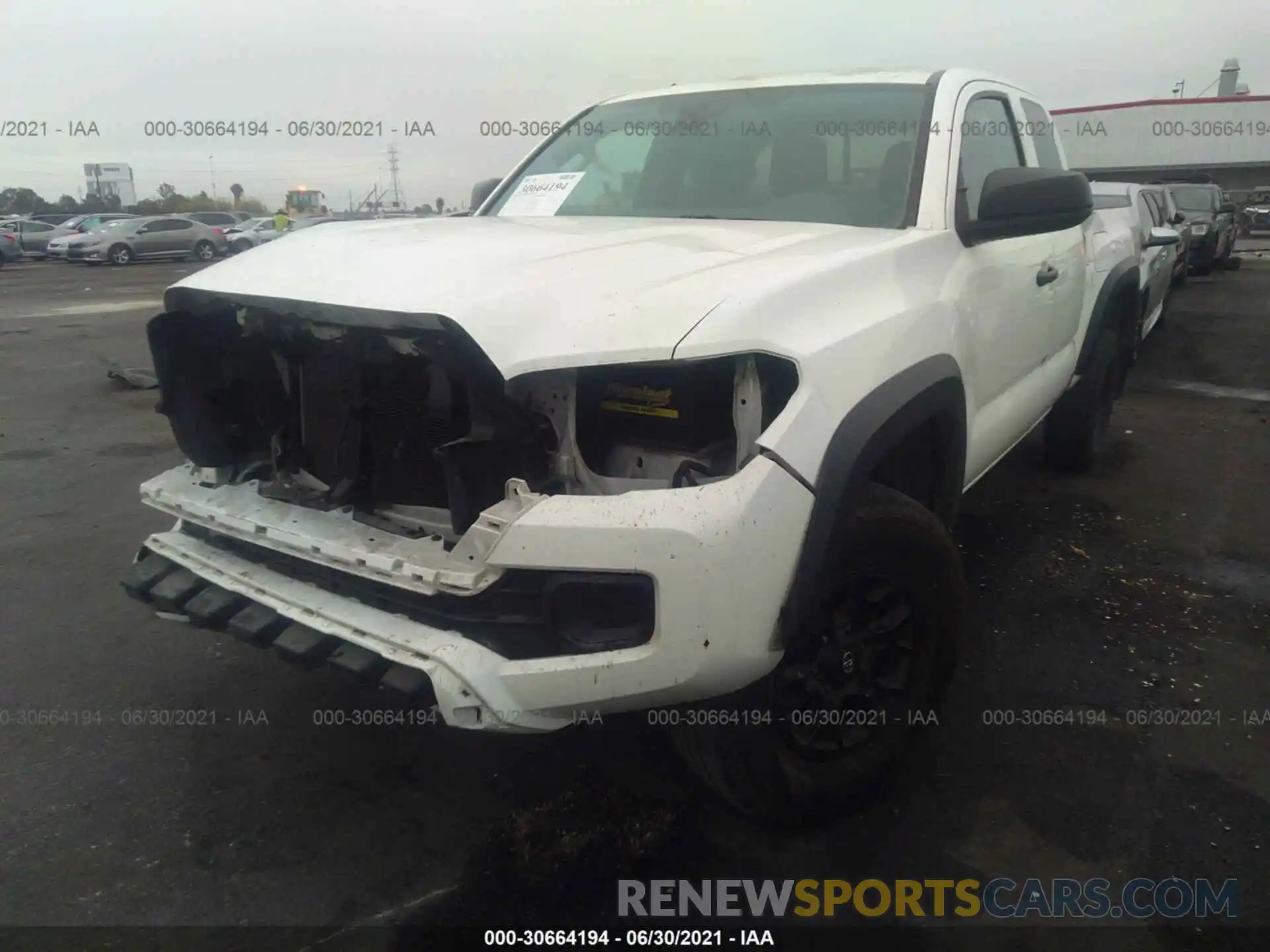 2 Photograph of a damaged car 5TFRX5GN5KX153114 TOYOTA TACOMA 2WD 2019