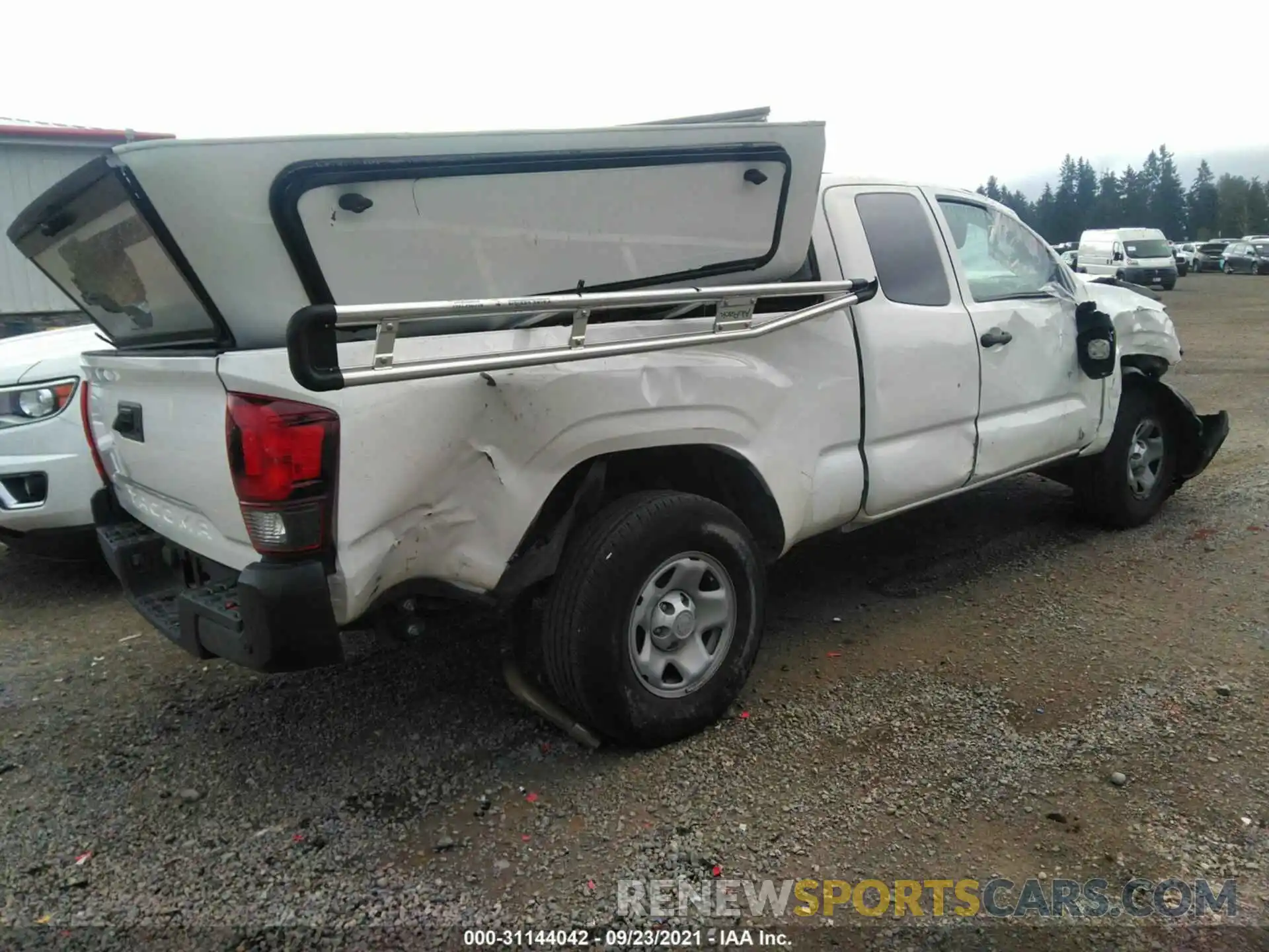 4 Photograph of a damaged car 5TFRX5GN6KX140985 TOYOTA TACOMA 2WD 2019