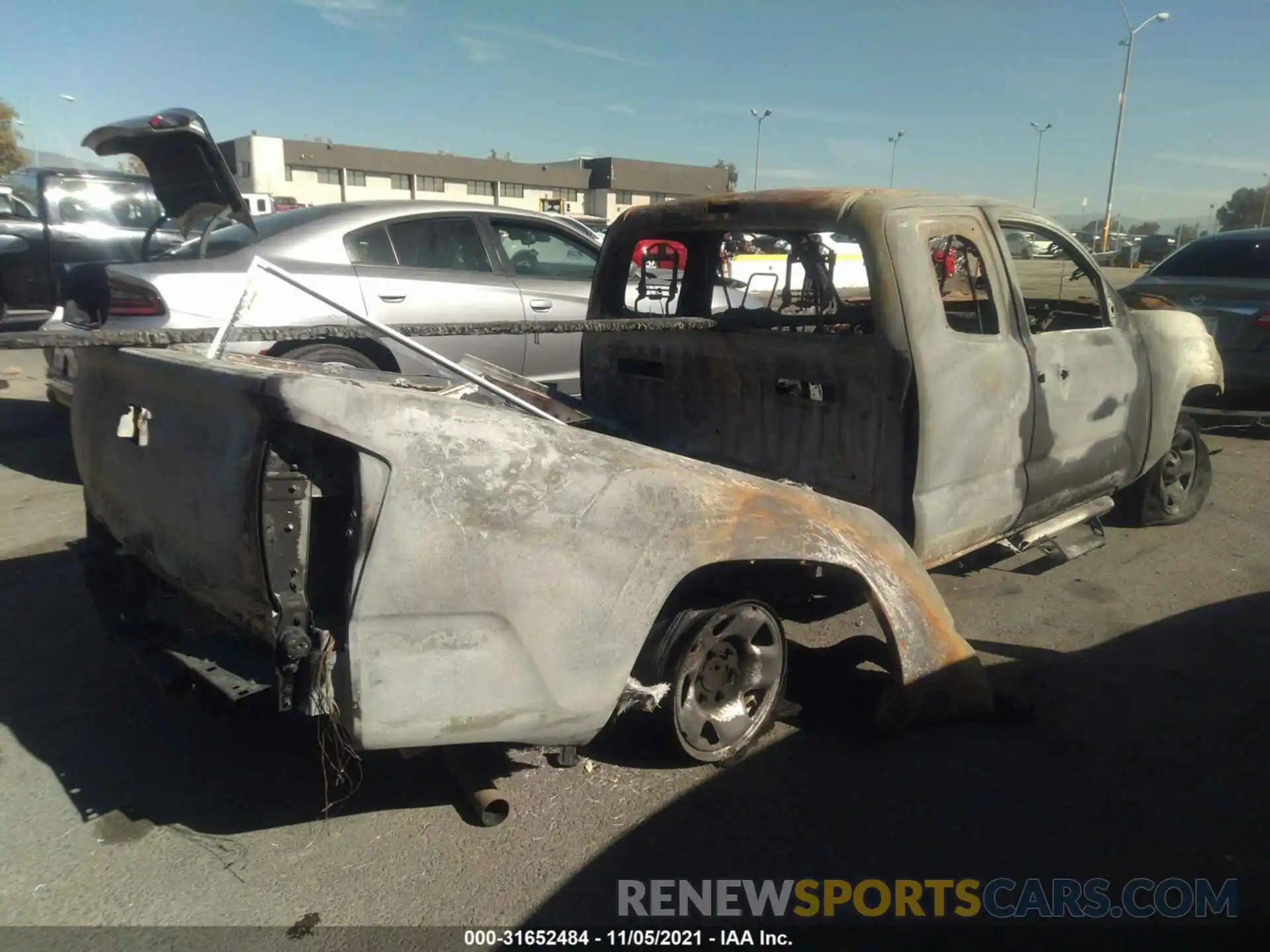 4 Photograph of a damaged car 5TFRX5GN6KX162498 TOYOTA TACOMA 2WD 2019