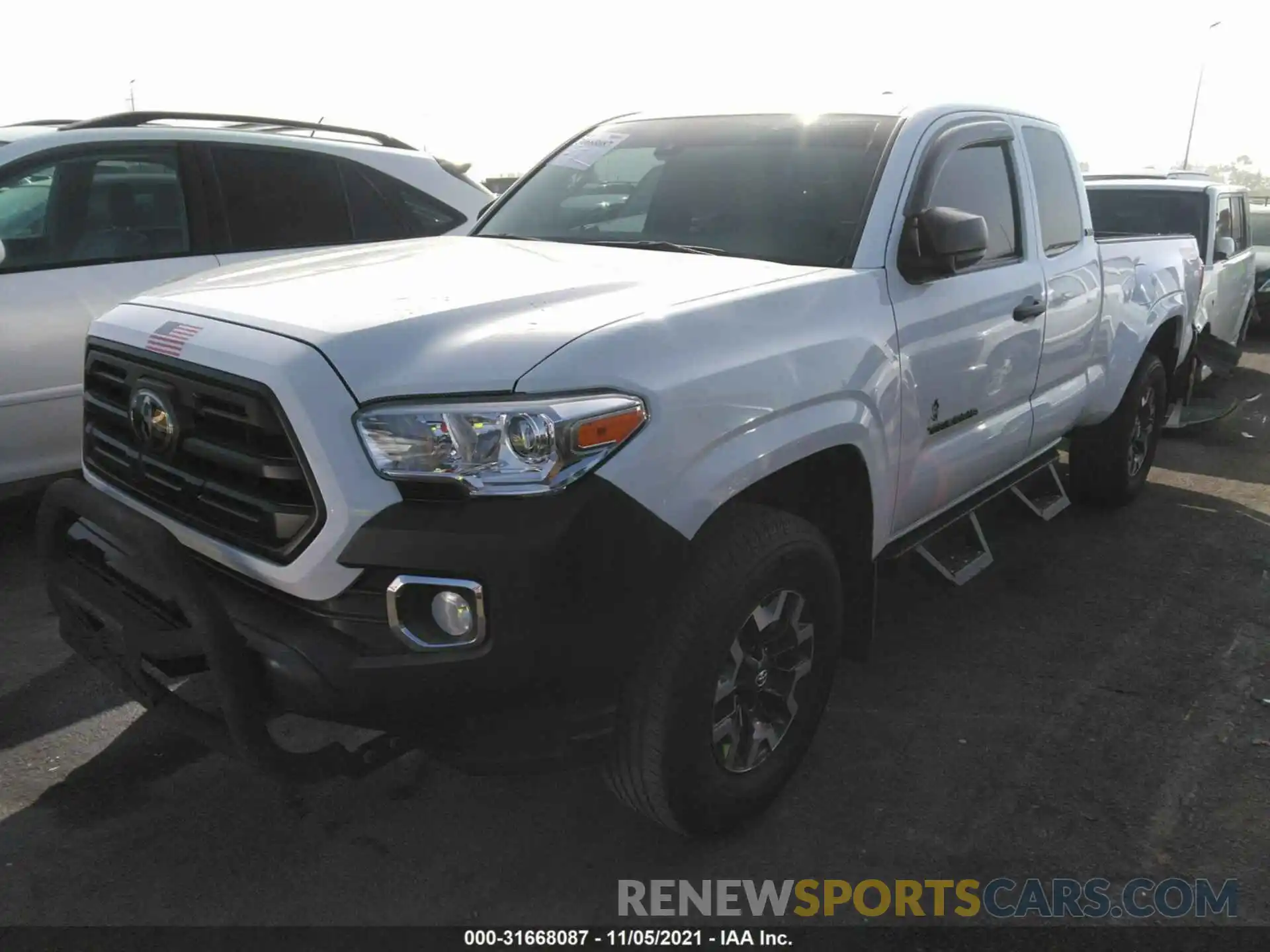 2 Photograph of a damaged car 5TFRX5GNXKX148331 TOYOTA TACOMA 2WD 2019